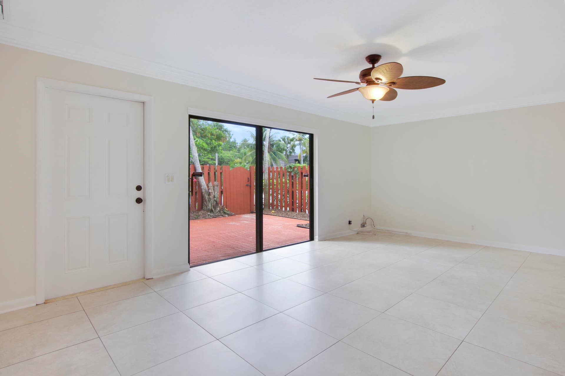 326 Jupiter Lakes Boulevard, #2318d, Jupiter, FL 33458 Sliding glass doors throughout the home provide generous sunlight.