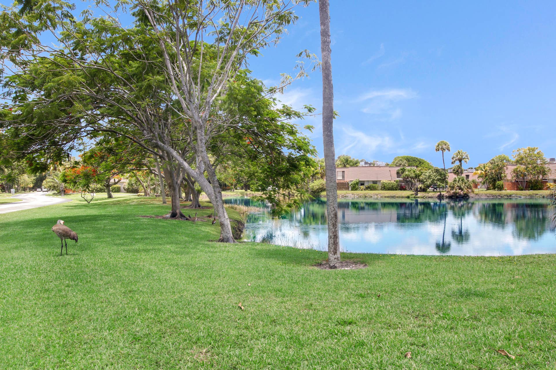 326 Jupiter Lakes Boulevard, #2318d, Jupiter, FL 33458 The unit is located adjacent to a pond.
