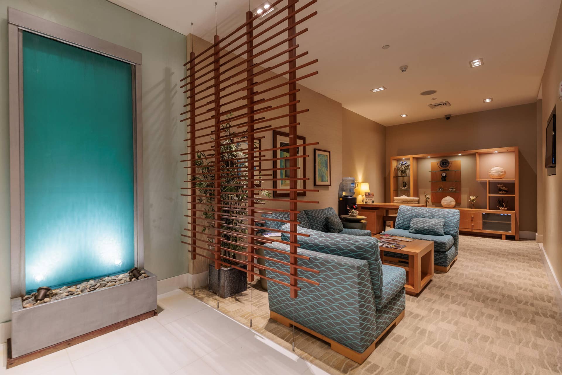 sitting area for the massage rooms and locker/ bathrooms.