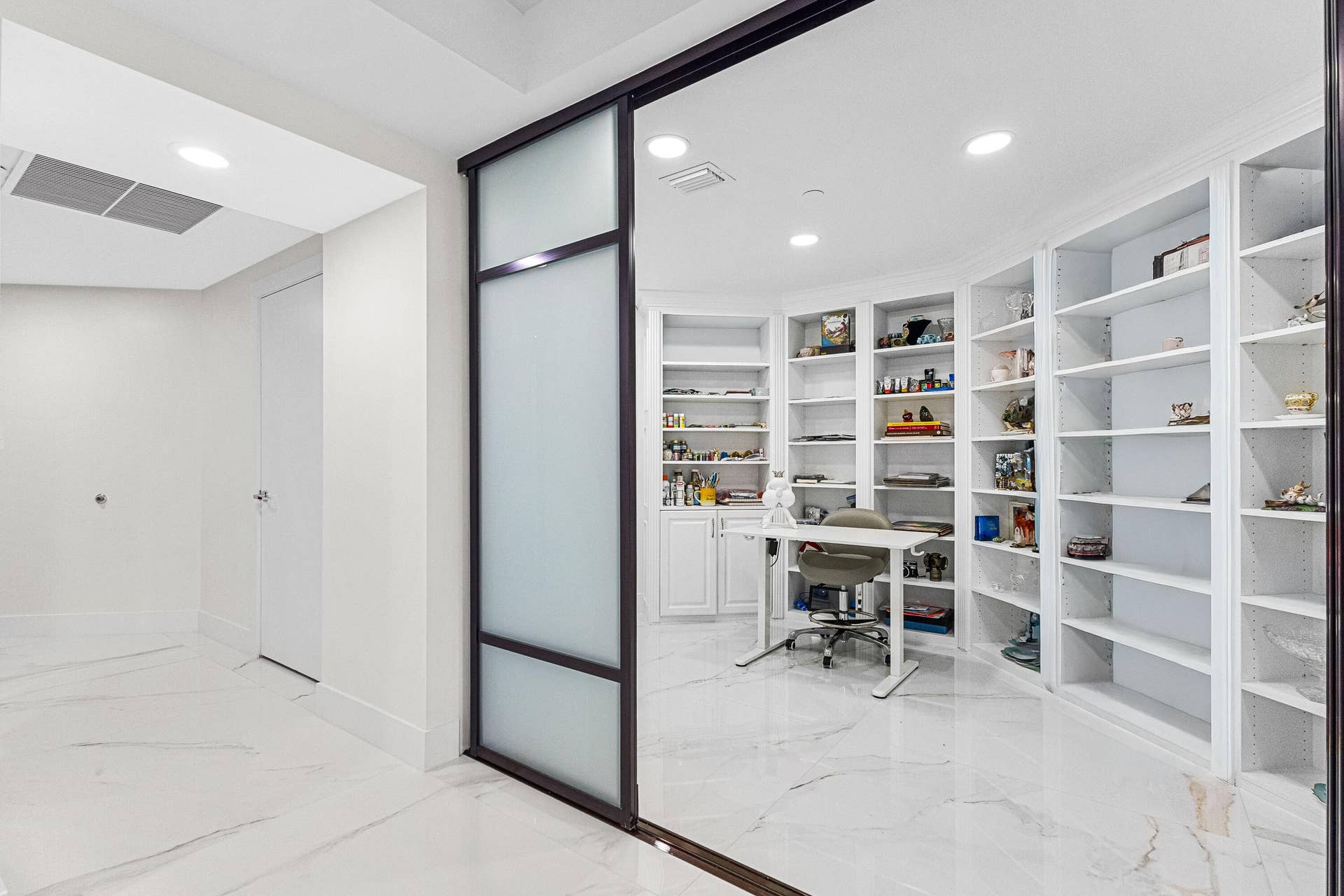 custom built in shelves, recess lighting, great lighting added!