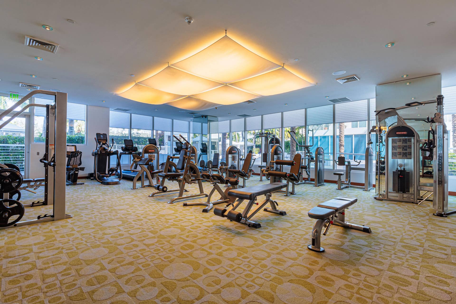 full service gym off of the pool area