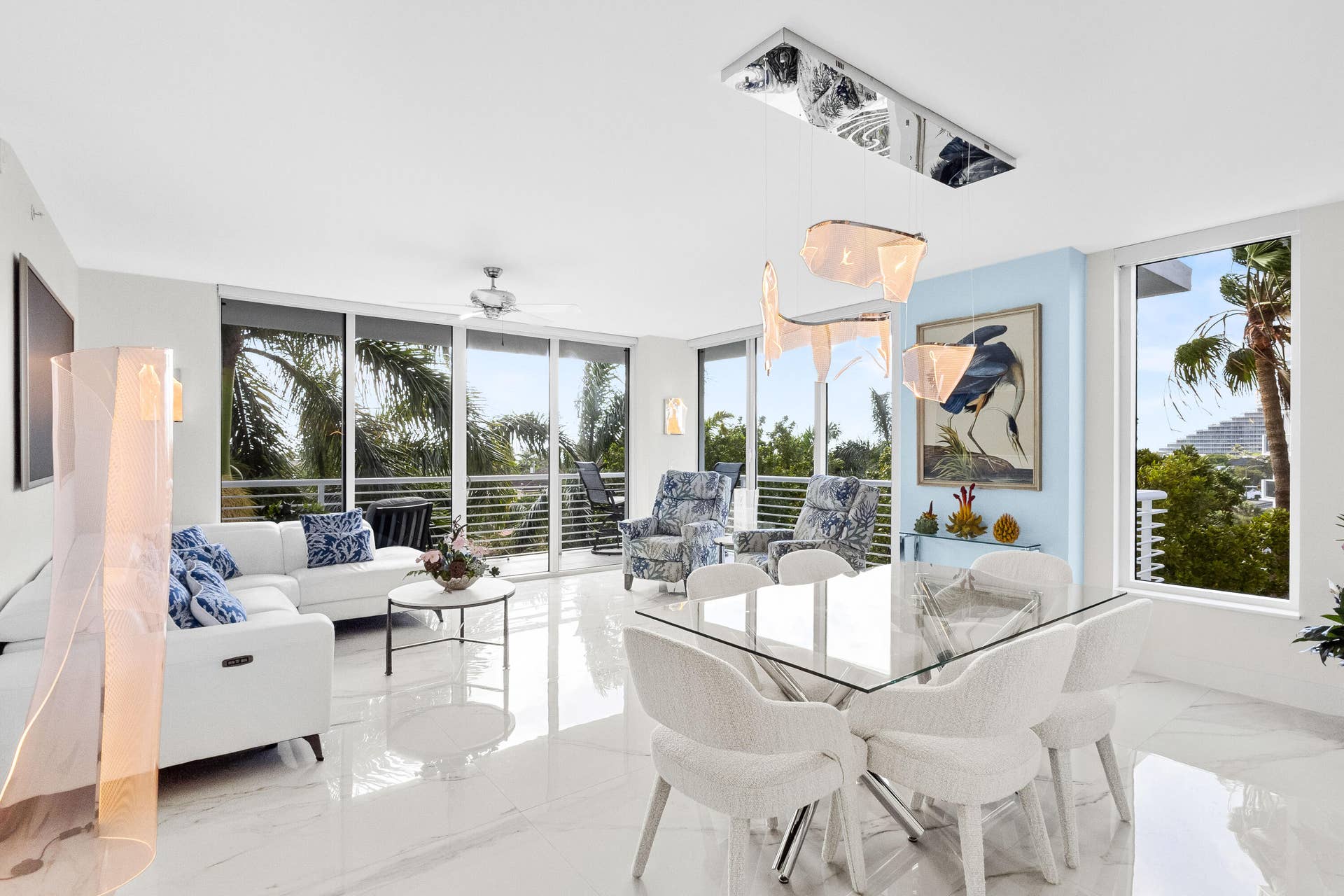 open concept living & dining room, with amazing natural light that leads you to the wrap around balcony.