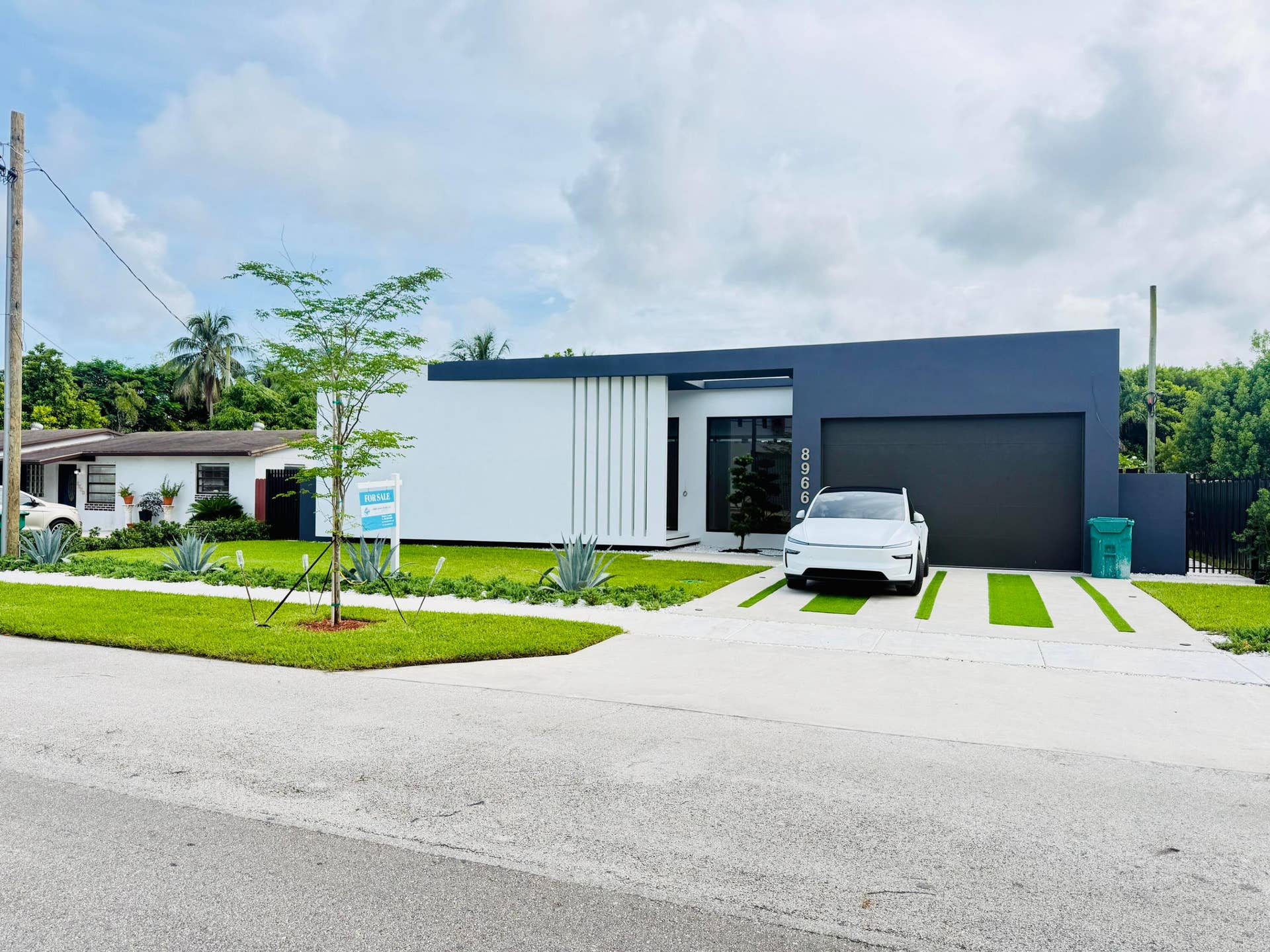8966 SW 40th Terrace, Miami, FL 33165 front tesla