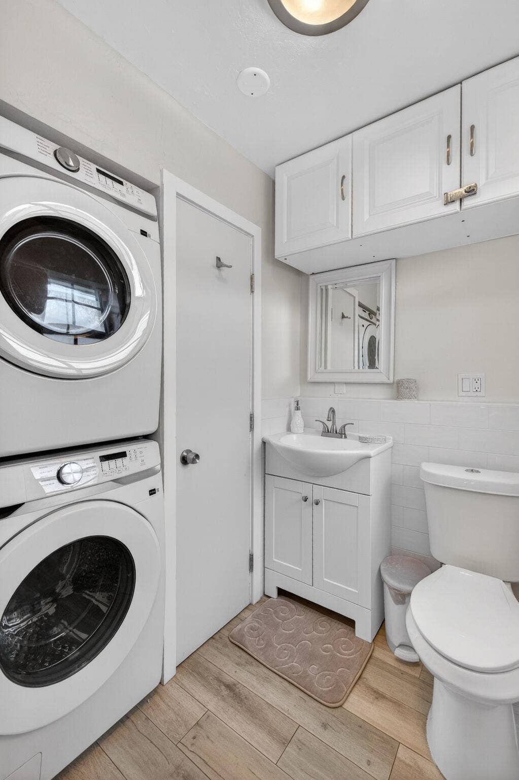 Unit #1 Half bath with washer/dryer