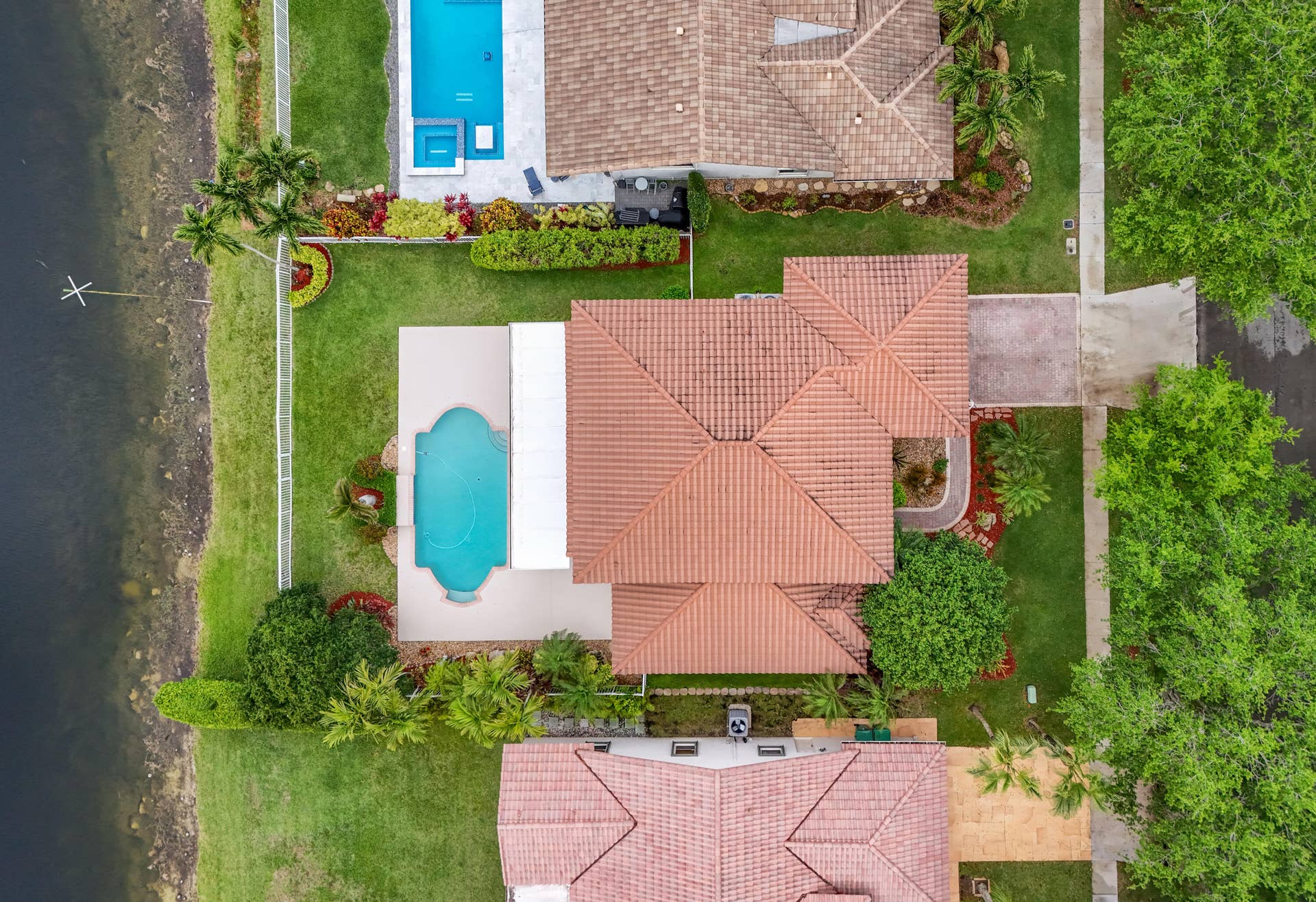 Aerial of House from Lake (left) to Street House front (right)
