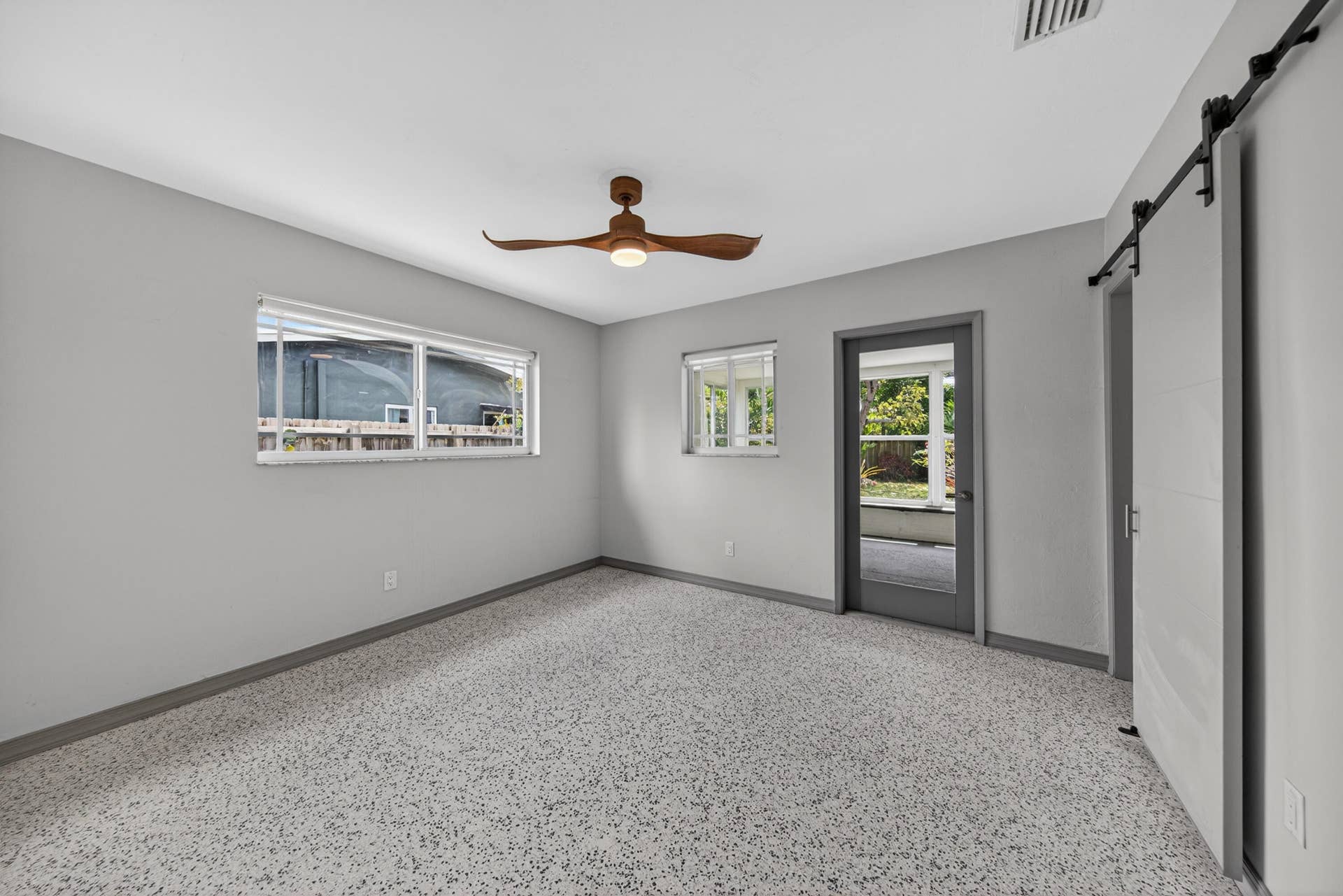 818 NW 28th Court, Wilton Manors, FL 33311 Primary bedroom with door to FL room