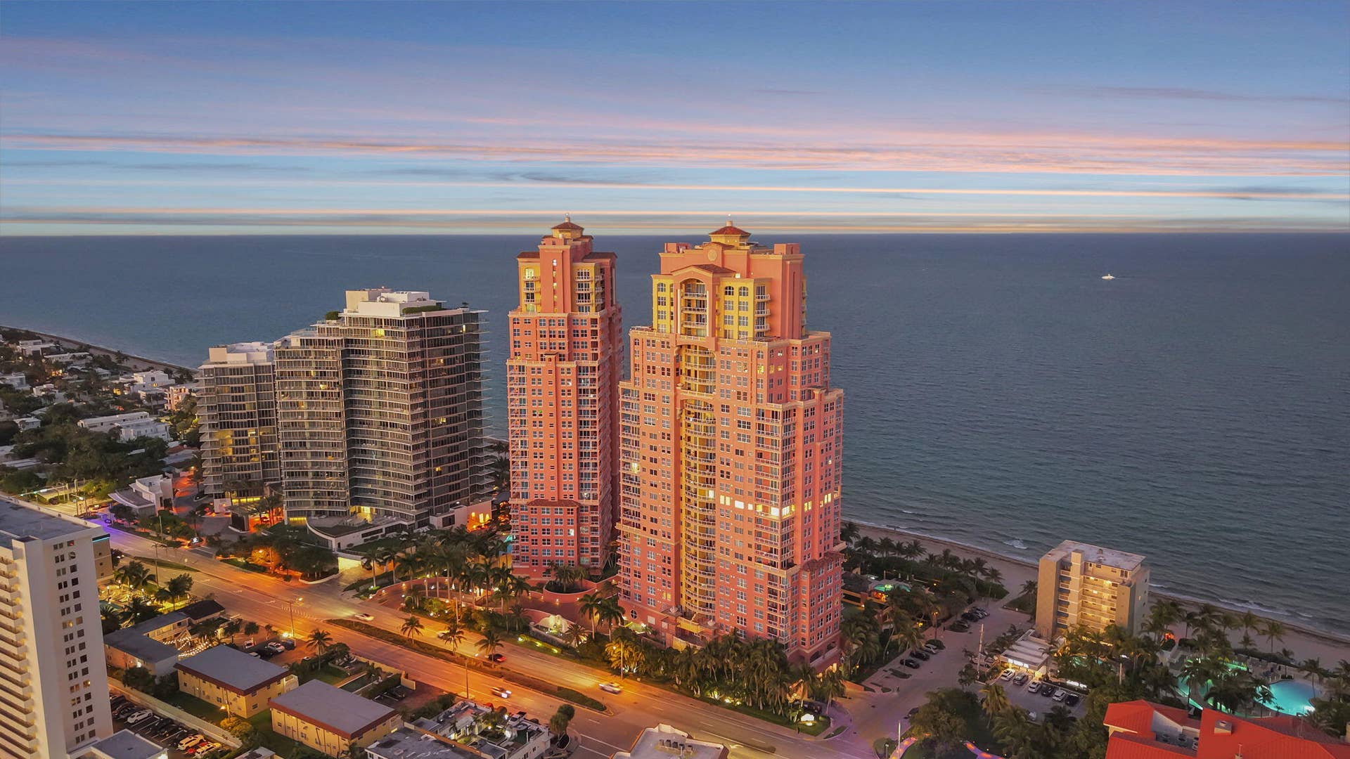 2 Exclusive Oceanfront Sunset Aerial