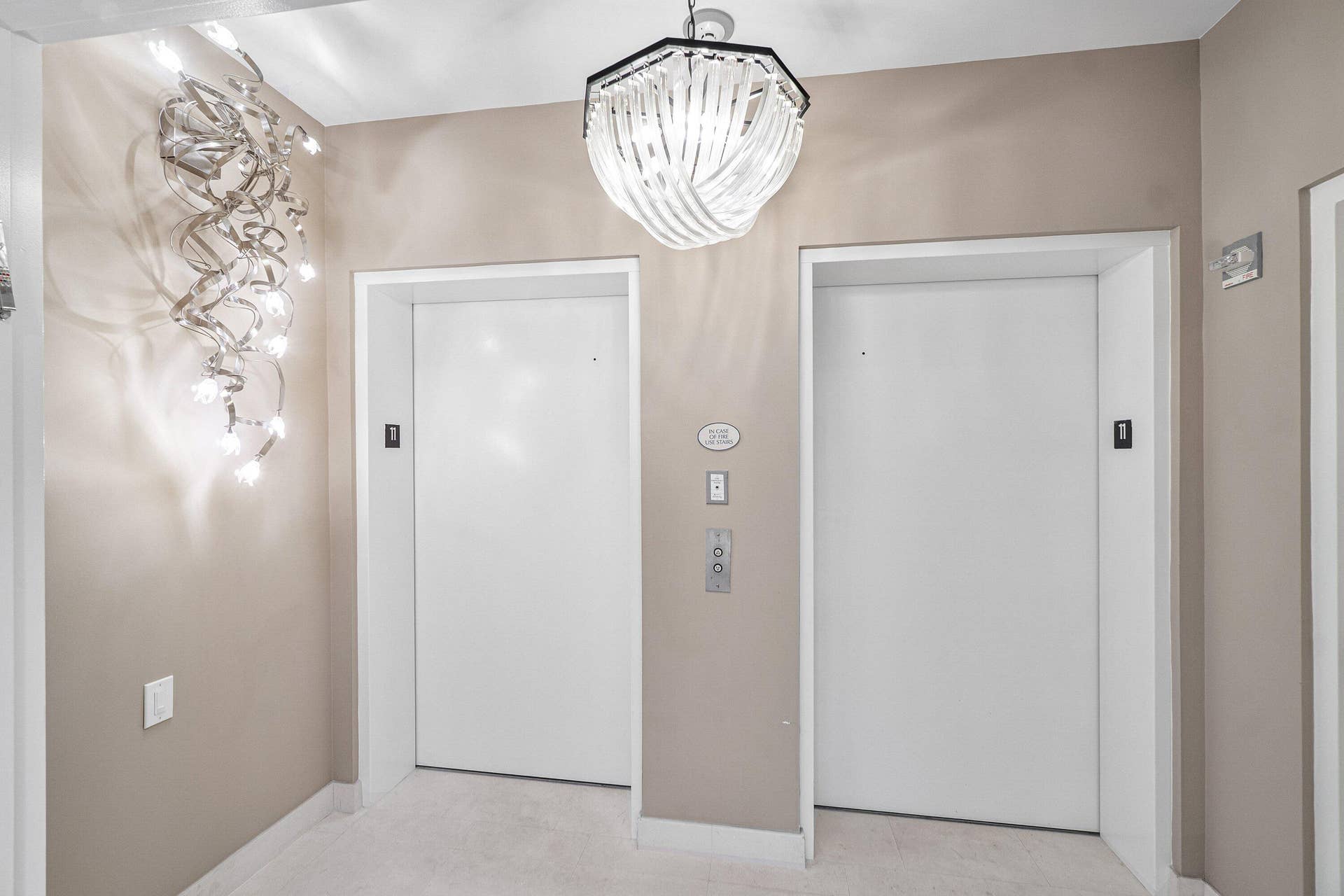 TWO ELEVATORS OPEN INTO YOUR PRIVATE VESTIBULE