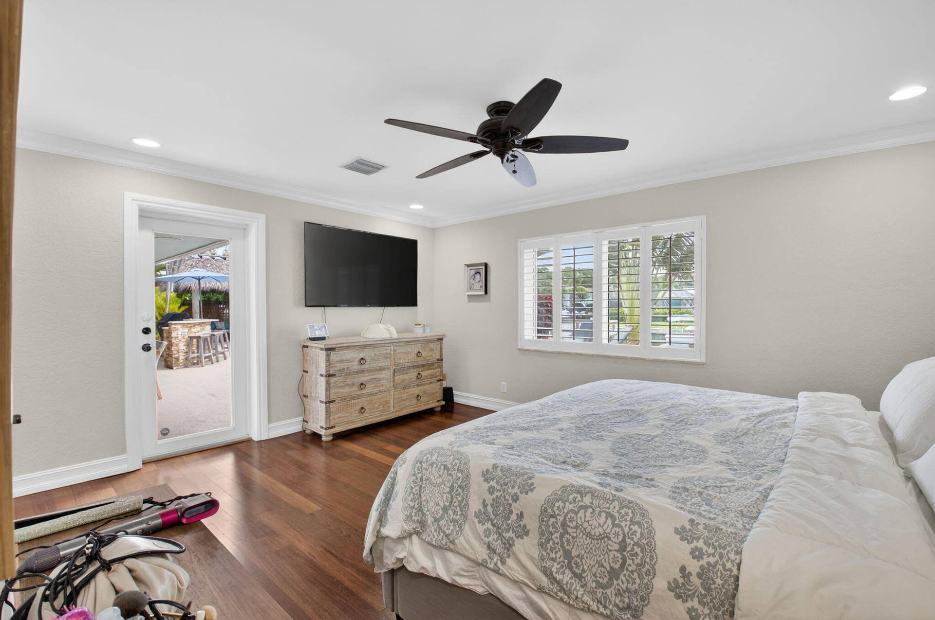 5800 NE 7th Avenue, Boca Raton, FL 33487 Primary bedroom overlooks the pool and water