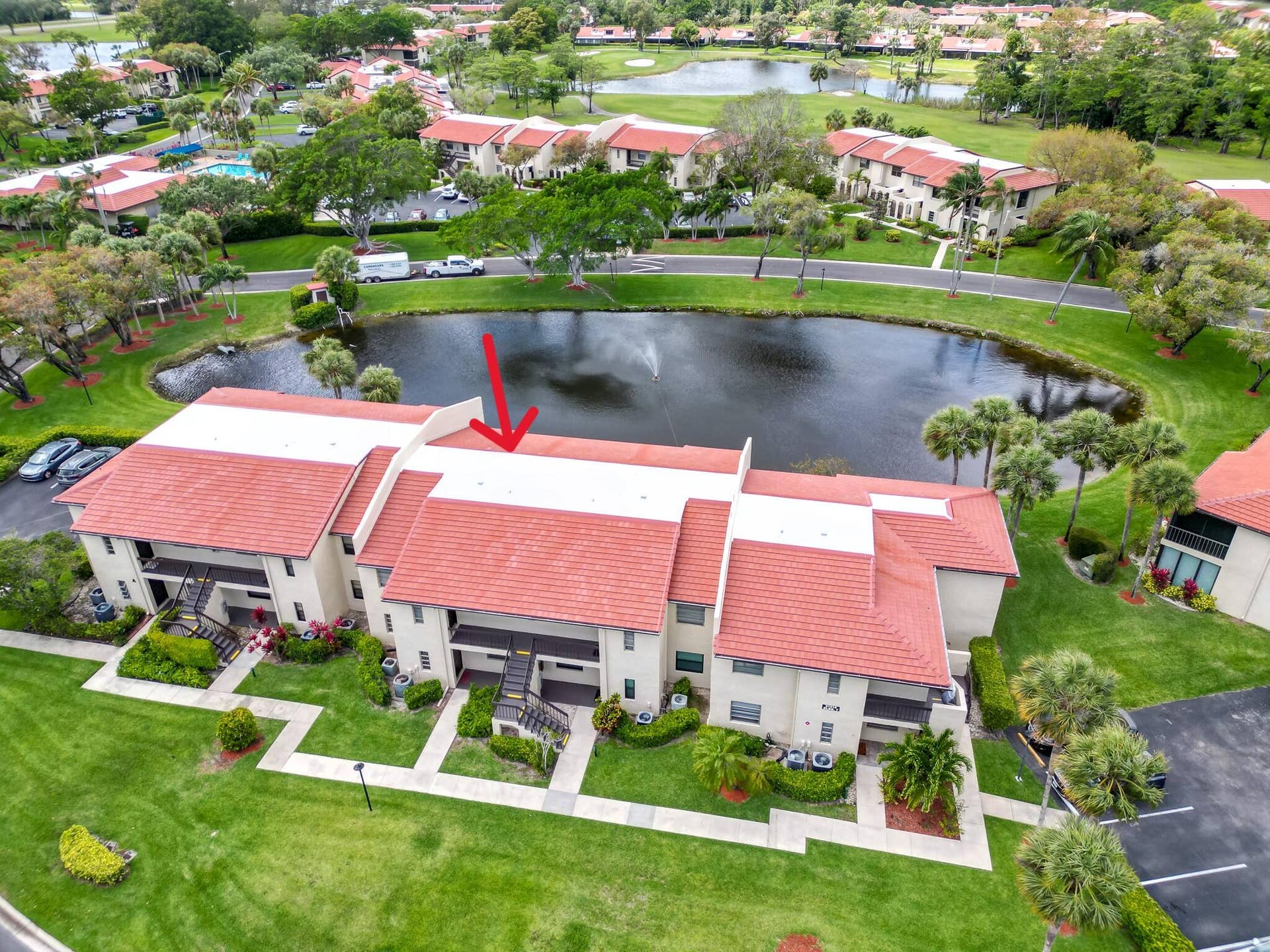 21218 Lago Circle, #F, Boca Raton, FL 33433 Arrow