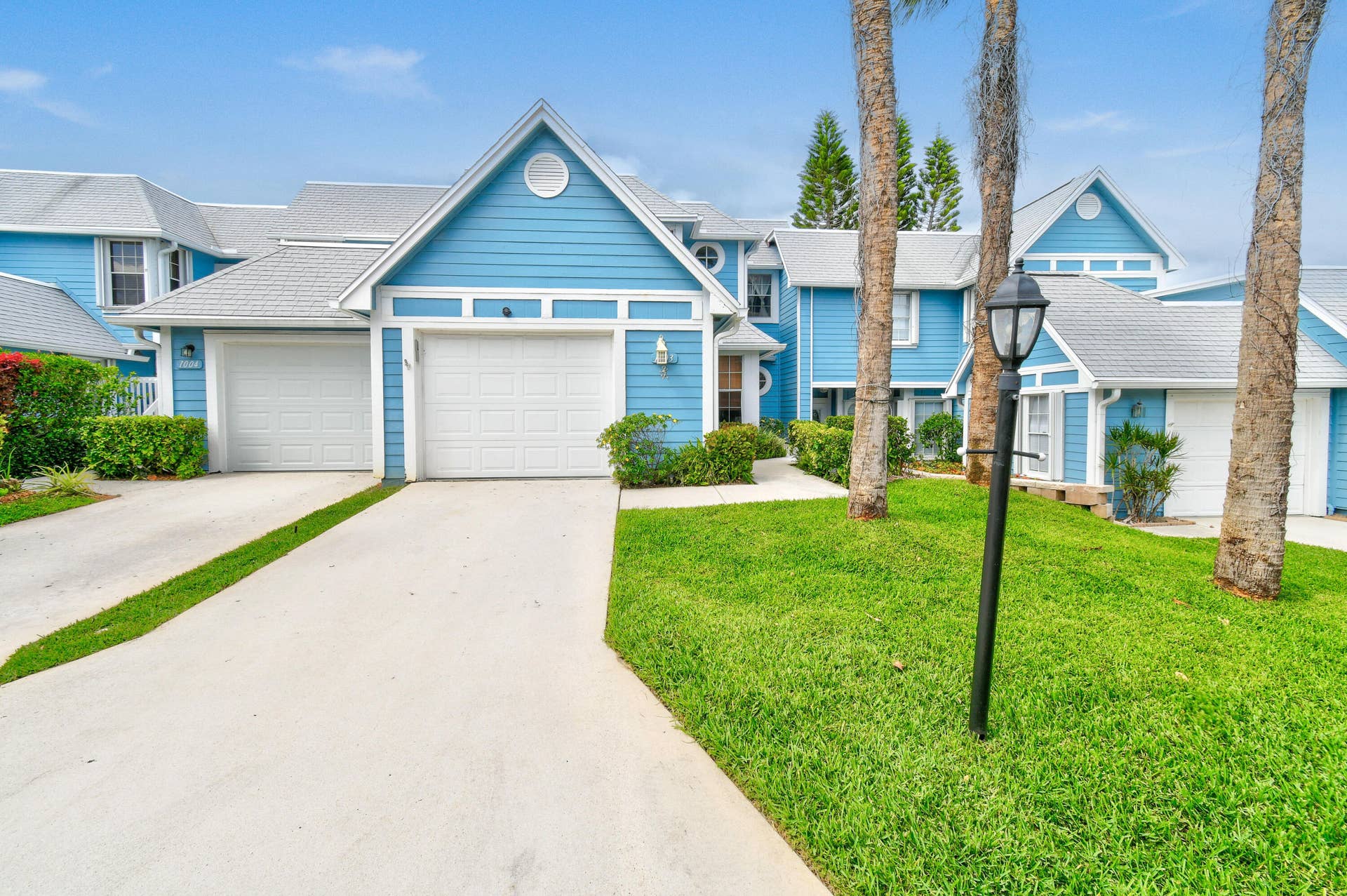 1003 Ocean Dunes Circle, Jupiter, Jupiter, FL 33477 One car garage and driveway parking.