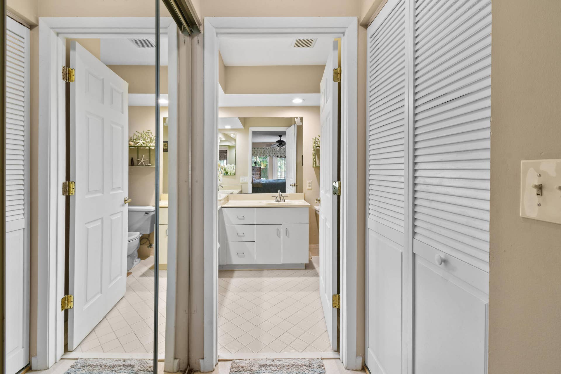 1003 Ocean Dunes Circle, Jupiter, Jupiter, FL 33477 Closets on both sides of entry to primary bathroom.
