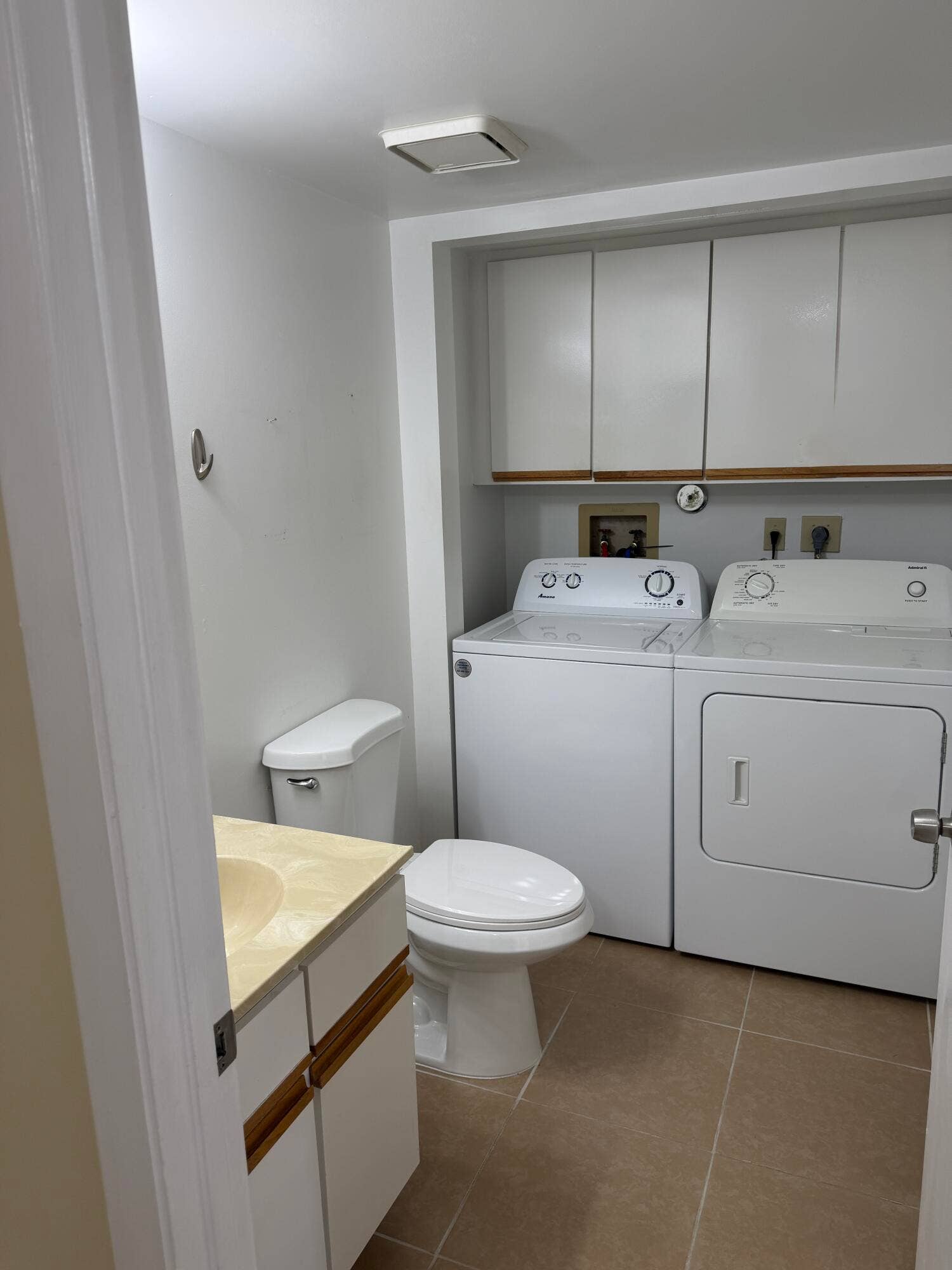 8461 Boca Rio Drive, Boca Raton, FL 33433 HALF BATH W/ WASHER/DRYER