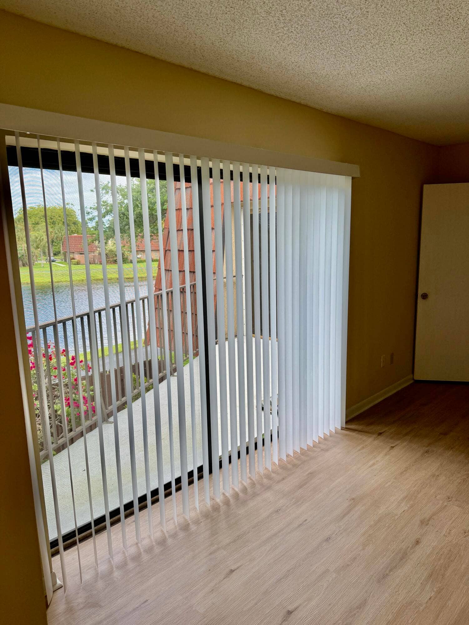 8461 Boca Rio Drive, Boca Raton, FL 33433 PRIMARY SLIDING DOORS TO BALCONY
