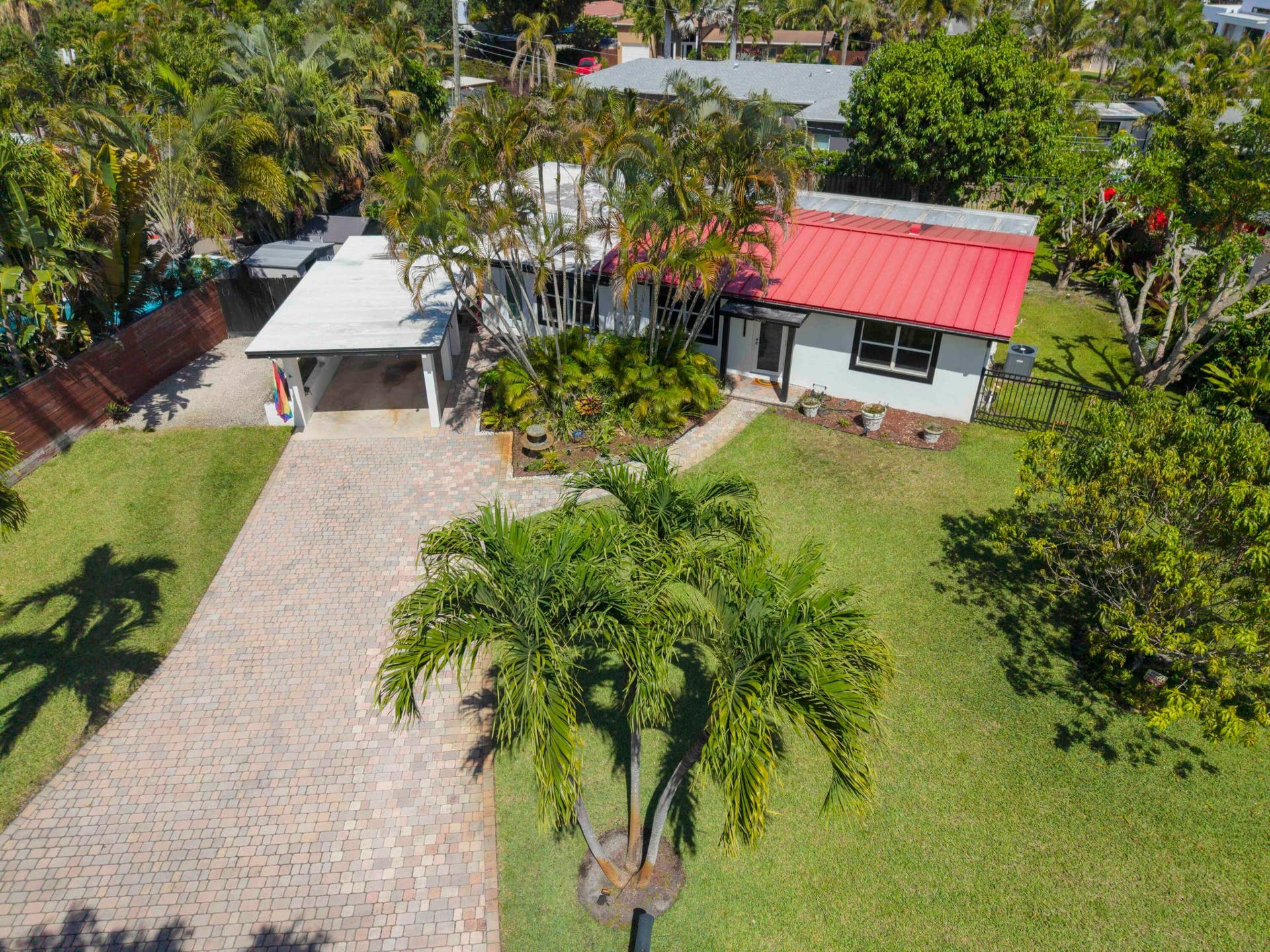 2800 NE 1st Avenue, Wilton Manors, FL 33334 Metal Roof, Carport with Storage plus Laundry Room