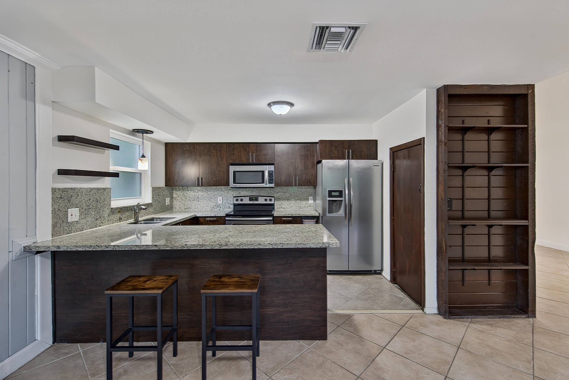 191 NE 6th Court, Dania Beach, FL 33004 Kitchen- looking from Family Room