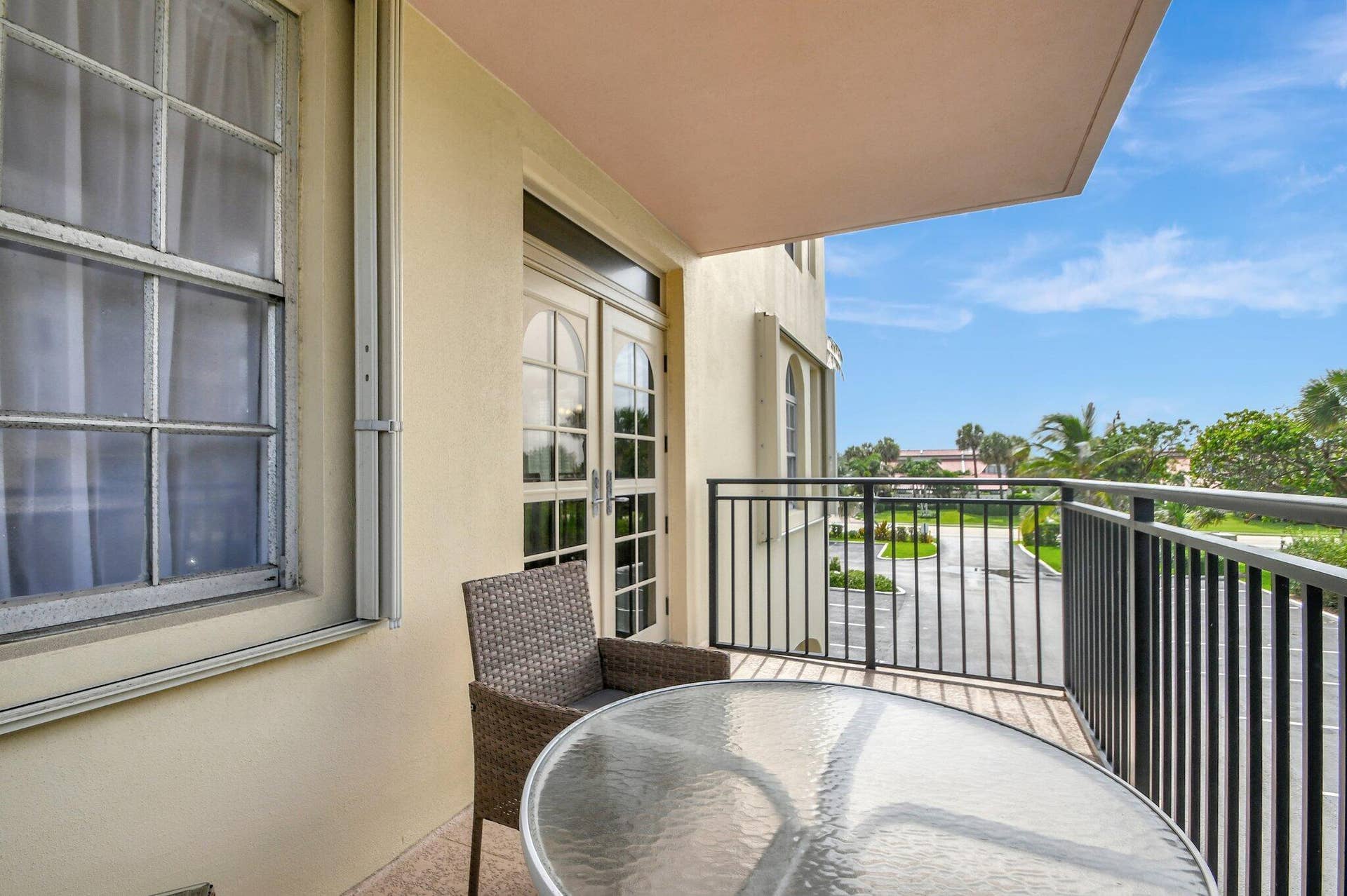 3475 S Ocean Boulevard, #116, Palm Beach, FL 33480 Living Room Balcony - Looking West