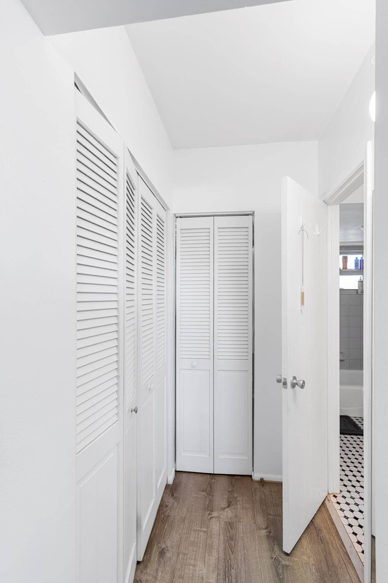 1212 SE 2nd Court, #303, Fort Lauderdale, FL 33301 hallway from bedroom to closets and bathrooms