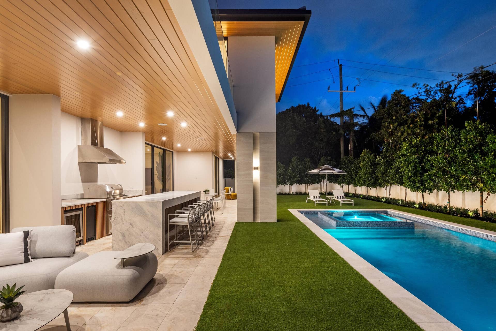 1351 Cocoanut Road, Boca Raton, FL 33432 POOL / SUMMER KITCHEN TWILIGHT