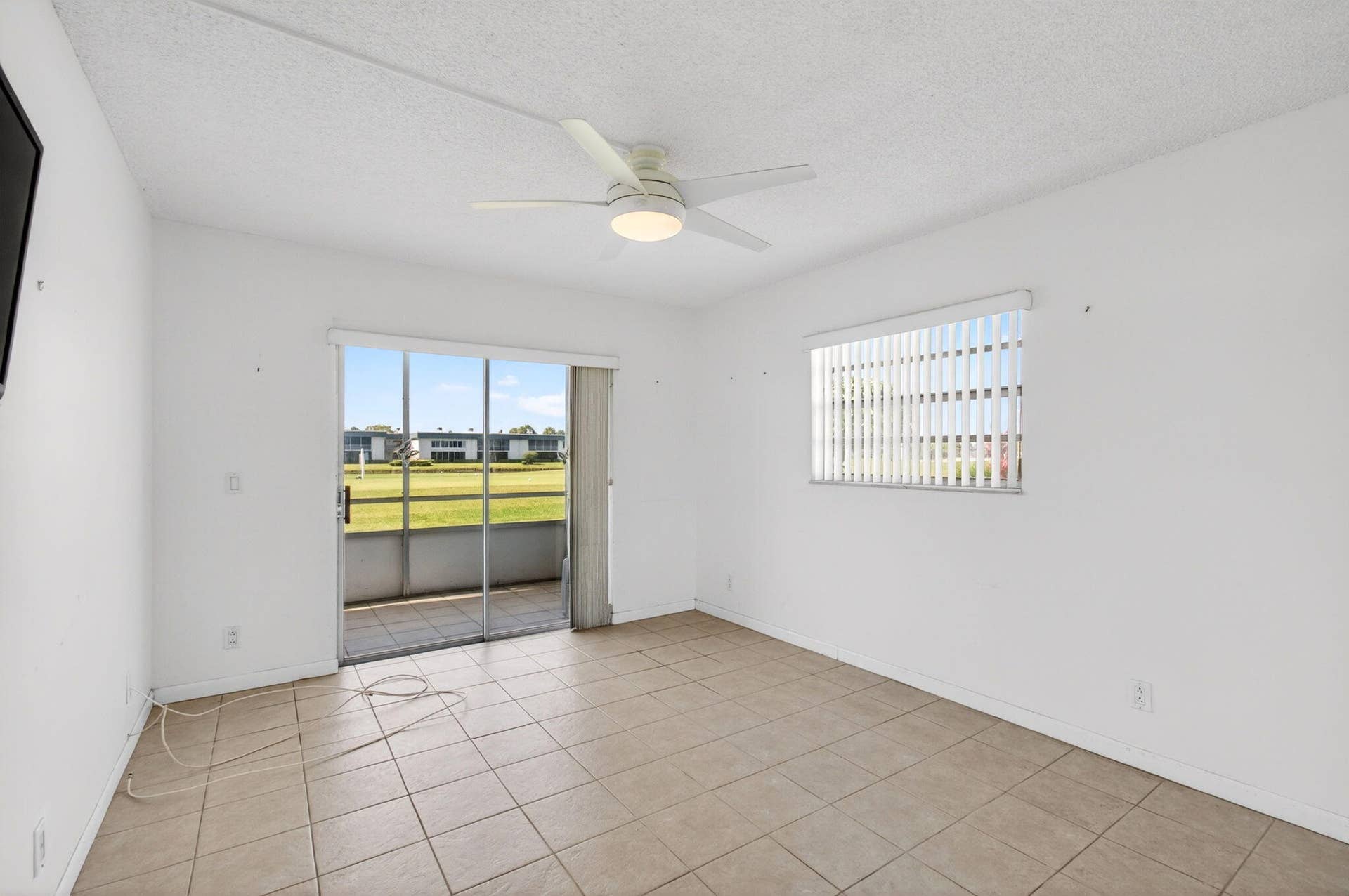 167 Normandy, #D, Delray Beach, FL 33484 Tiled Bedroom with Golf Views