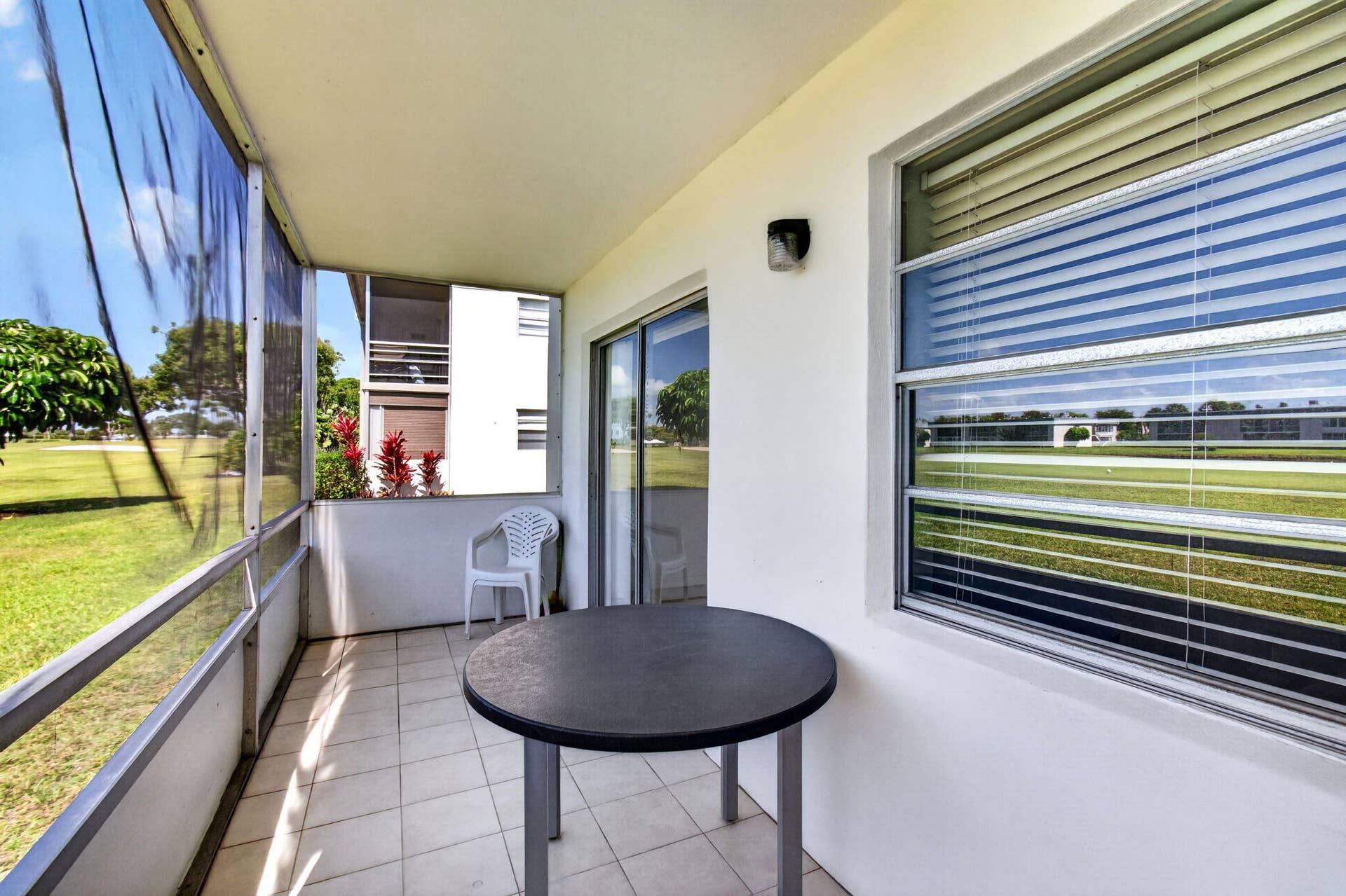 167 Normandy, #D, Delray Beach, FL 33484 Golf Course views from the Screened Patio and Bedroom
