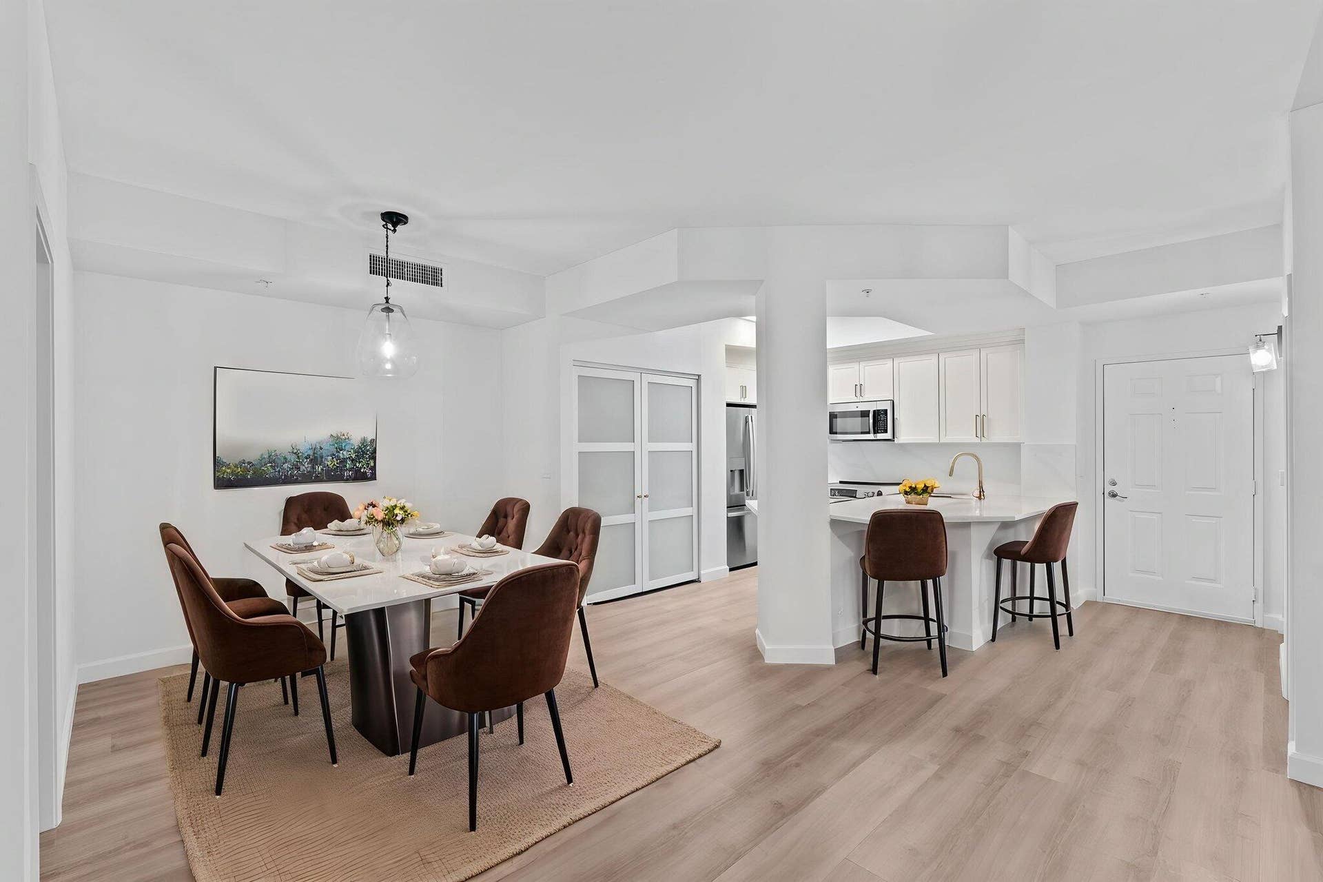 720 S Sapodilla Avenue, #106, West Palm Beach, FL 33401 Kitchen/dining area virtually staged