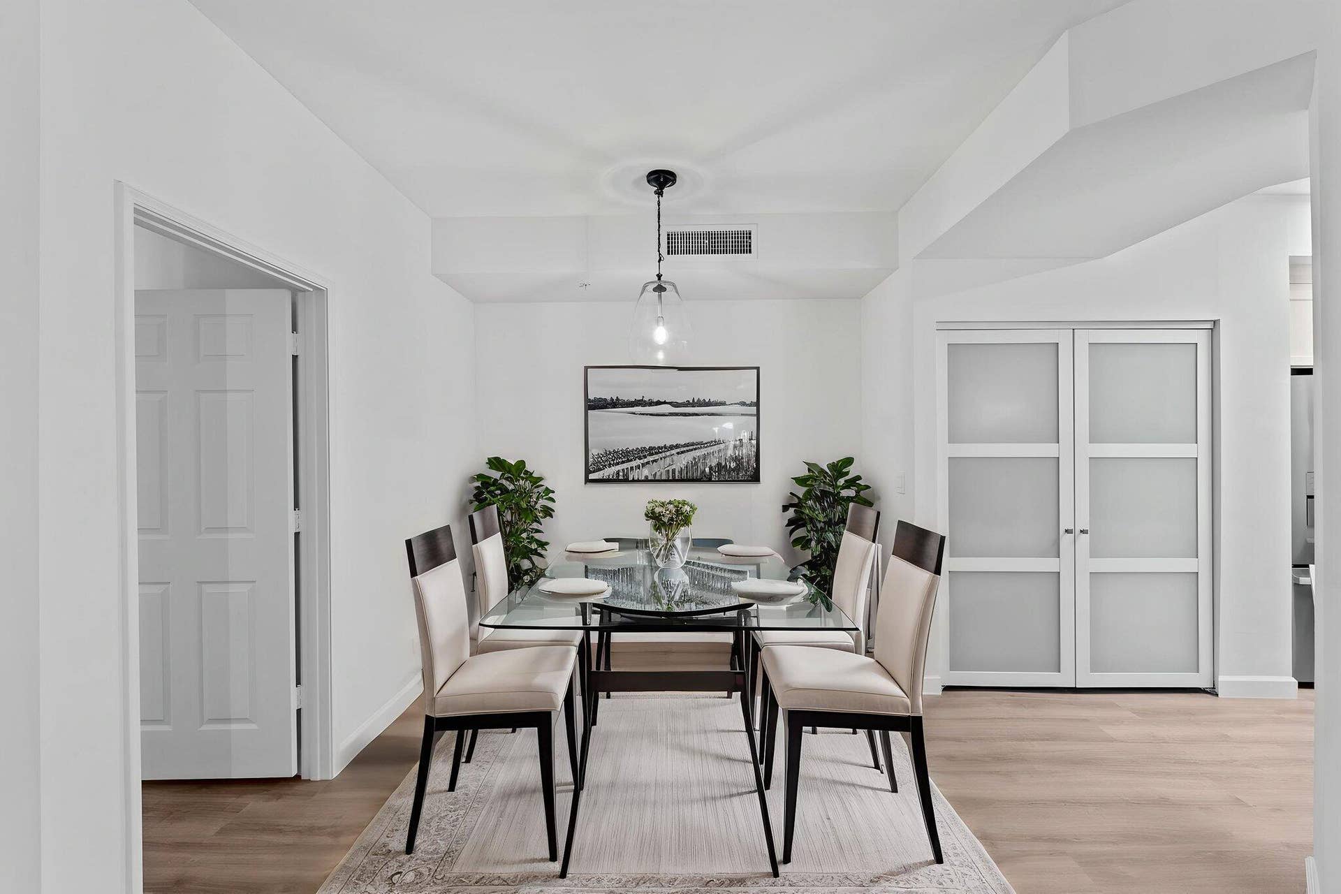 720 S Sapodilla Avenue, #106, West Palm Beach, FL 33401 Dining area virtually staged