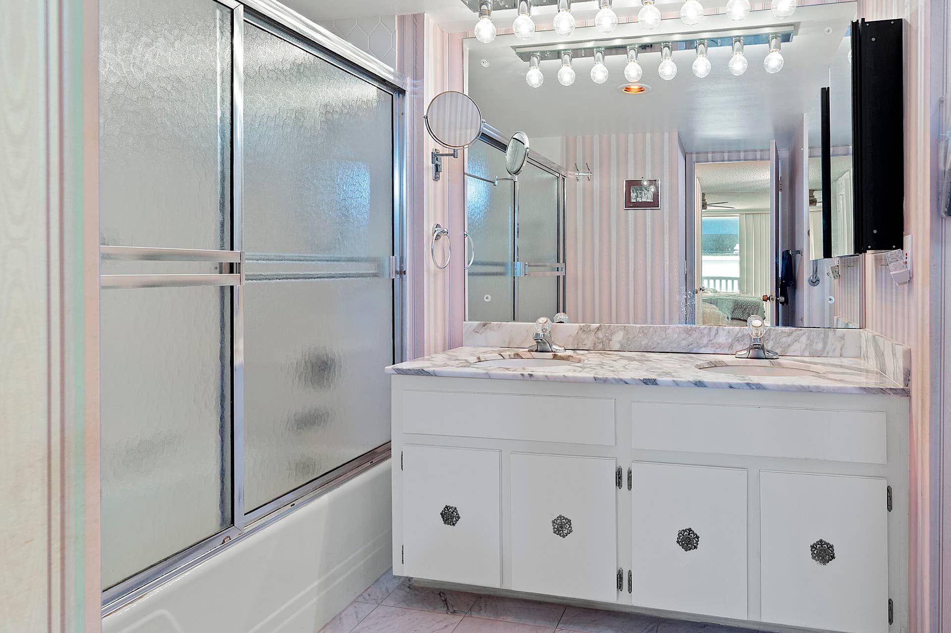 Master Bathroom with Tub Shower Combo and Double Vantities