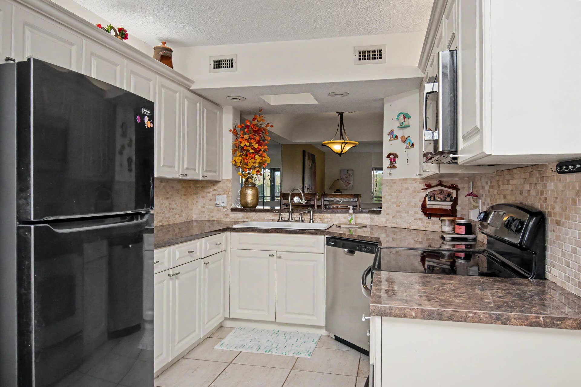 23370 N Carolwood Lane N, #409, Boca Raton, FL 33428 DF180E95-384E-43D6-B990-86944341A600