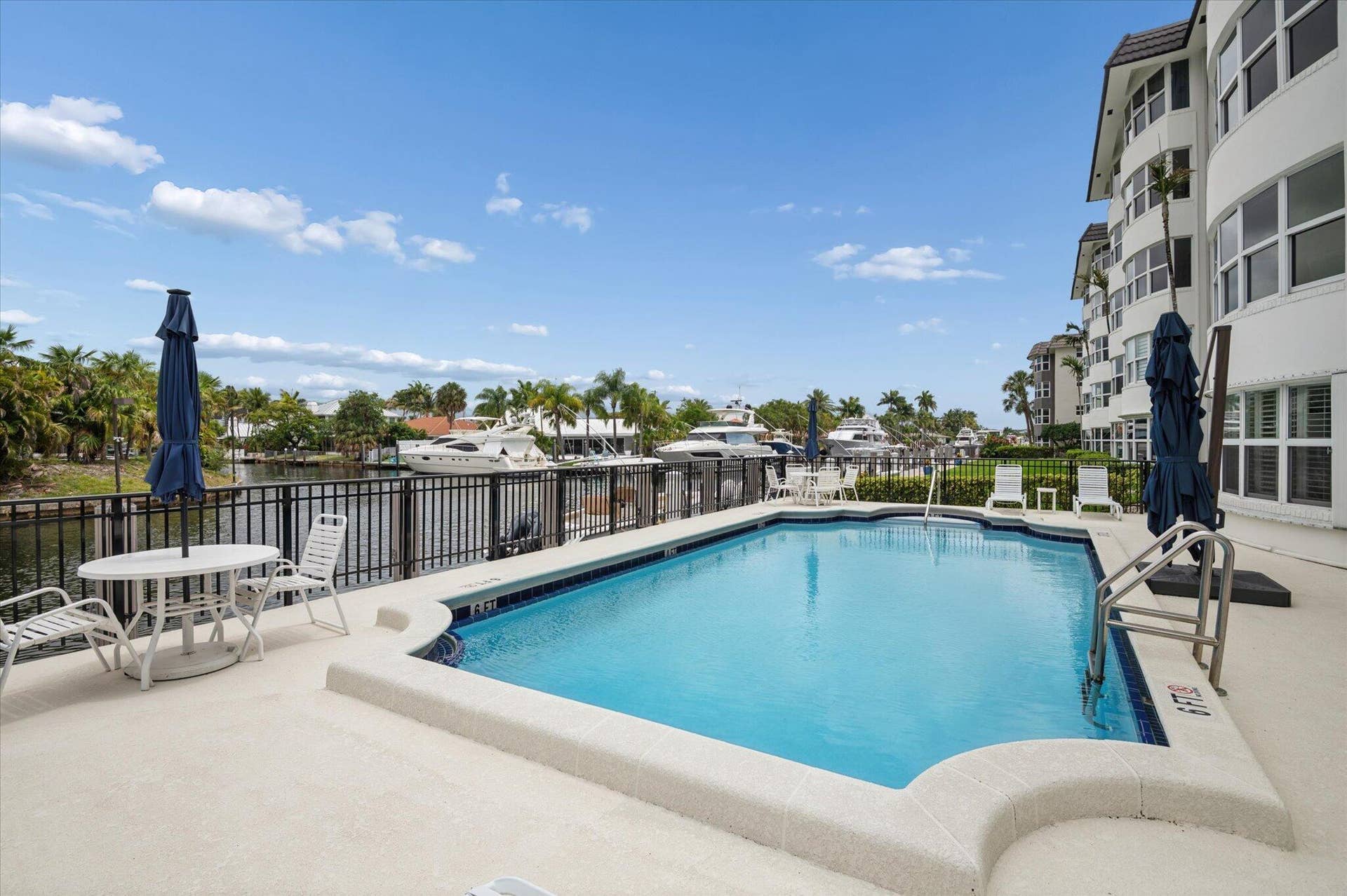 5100 Bayview Drive, #106, Fort Lauderdale, FL 33308 Waterfront pool area overlooking the canalperfect for relaxing or entertaining.
