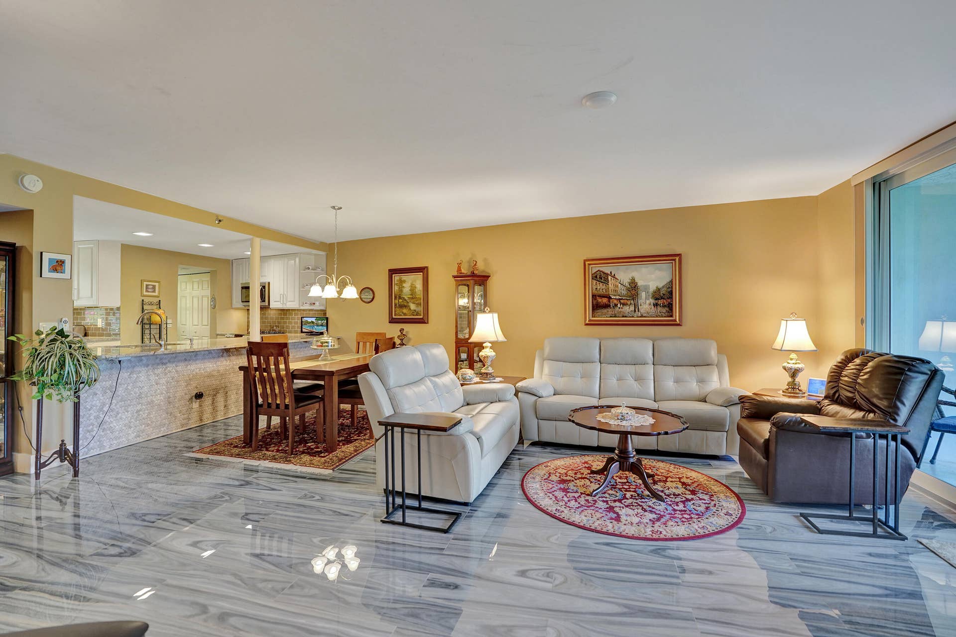 3499 Oaks Way, #Unit 205, Pompano Beach, FL 33069 Stunning Living Space open to Kitchen and screened porch