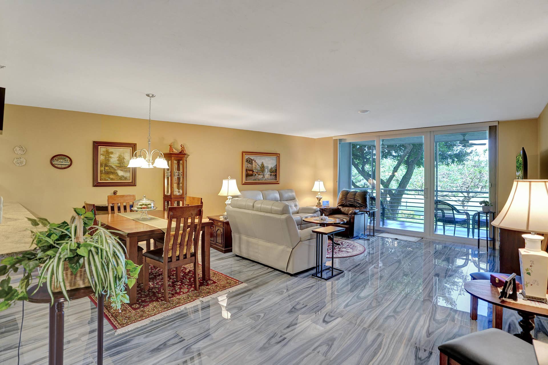 3499 Oaks Way, #Unit 205, Pompano Beach, FL 33069 Elegant living space. Impact Glass and Plantation Shutters throughout.