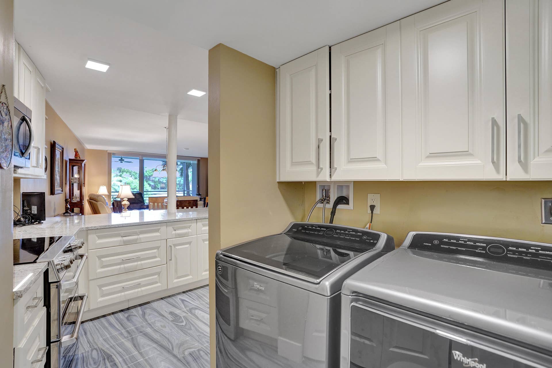 3499 Oaks Way, #Unit 205, Pompano Beach, FL 33069 Full sized in-unit laundry and Pantry just off the kitchen