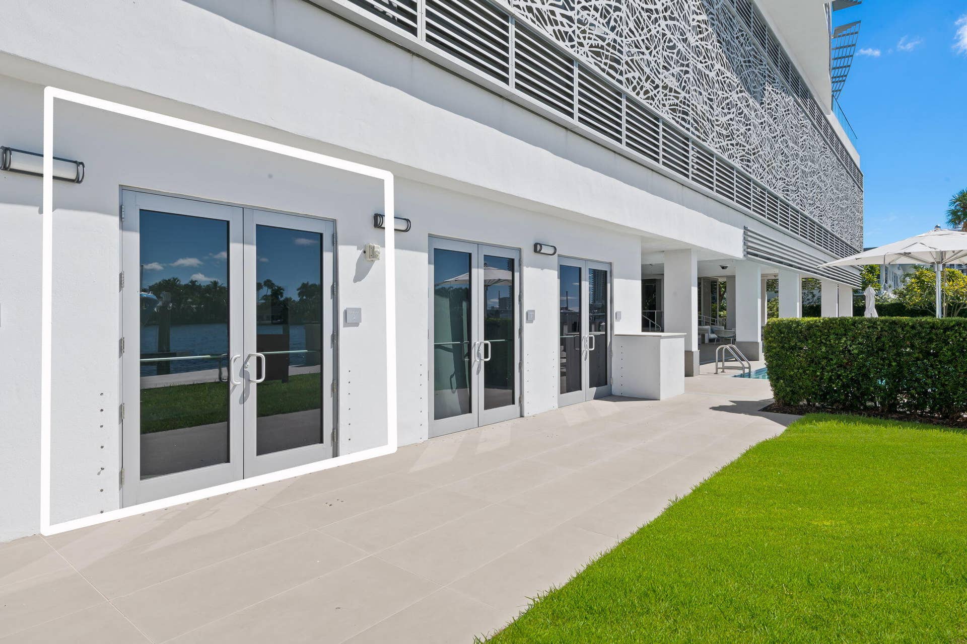 435 Bayshore Drive, #302, Fort Lauderdale, FL 33304 Glass door entrance of Private air-conditioned Intracoastal Poolside Cabana
