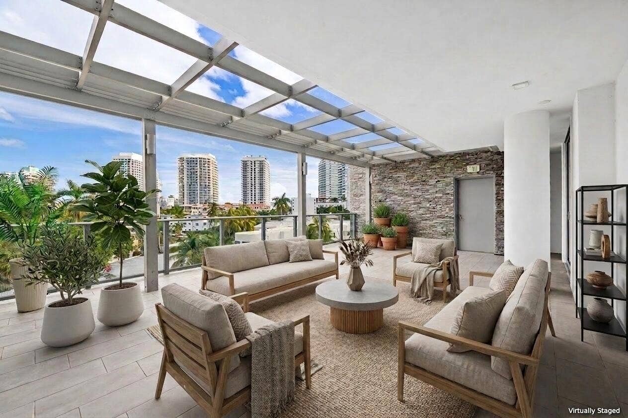 435 Bayshore Drive, #302, Fort Lauderdale, FL 33304 Virtually staged Expansive 555 SF. Lanai with Pergola