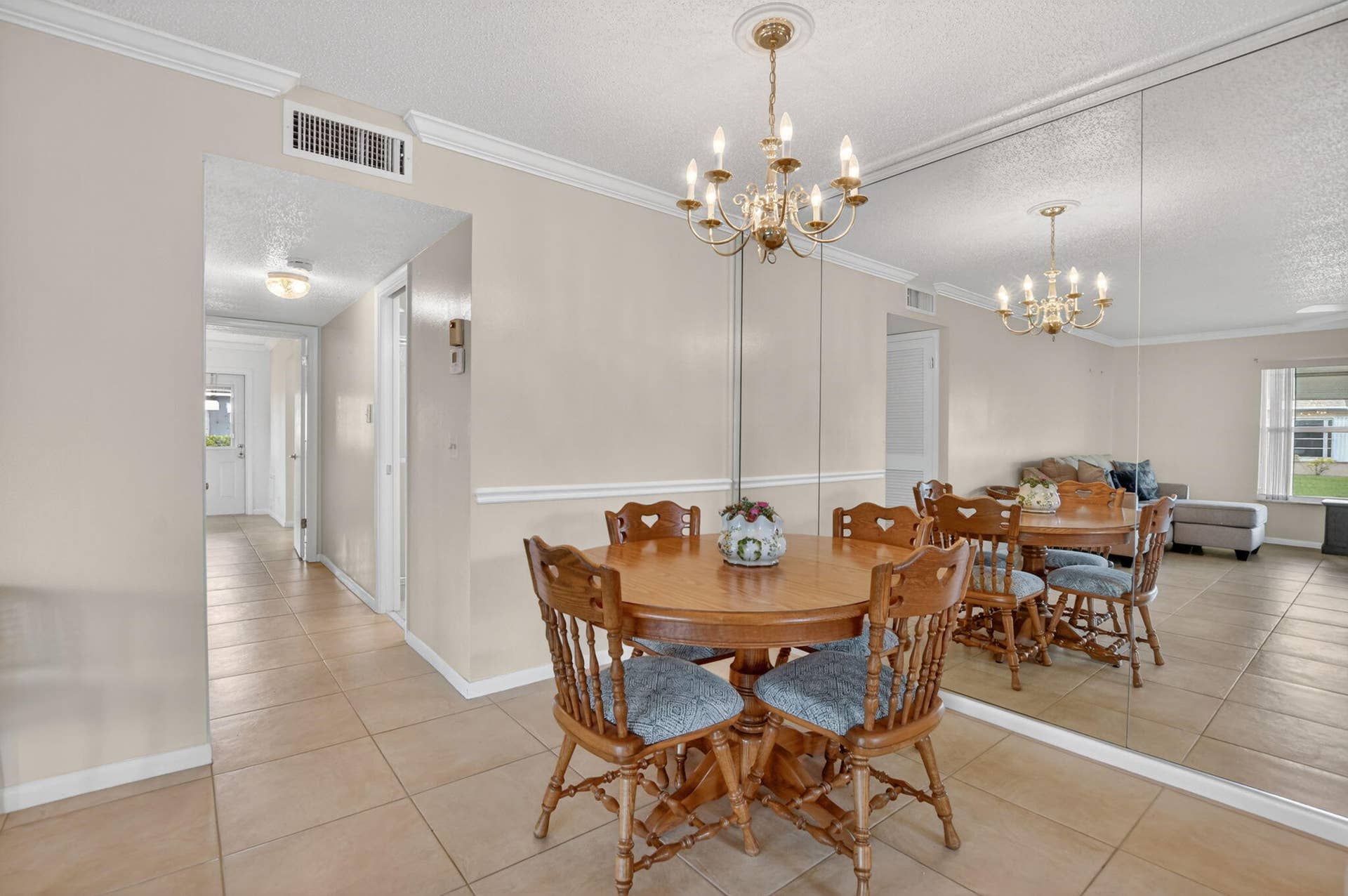 Hallway leads to beds, baths and outdoor patio