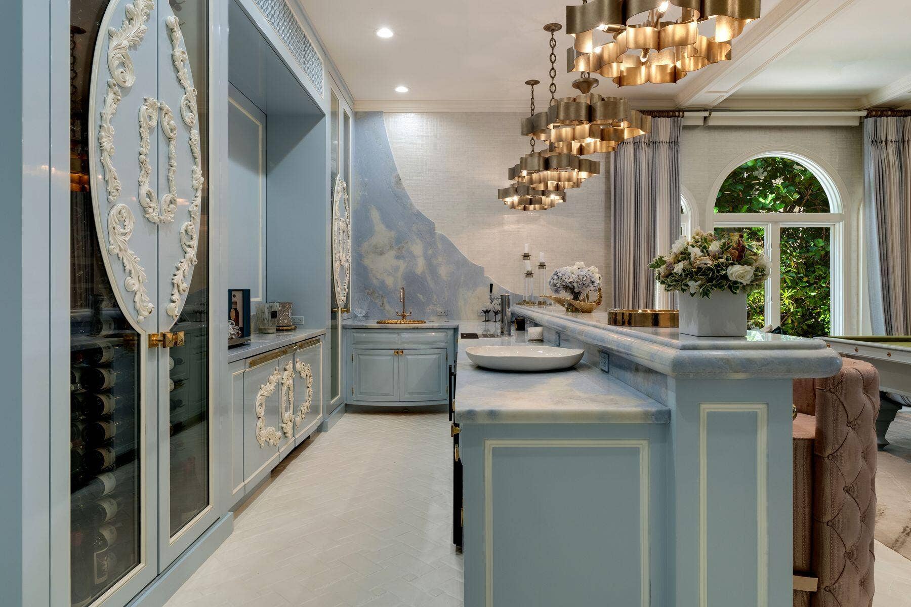 1131 Hillsboro Mile, Hillsboro Beach, FL 33062 Elegant inside bar with built in wine cabinets hidden flat screen tv and built in pop up wine cruvenet