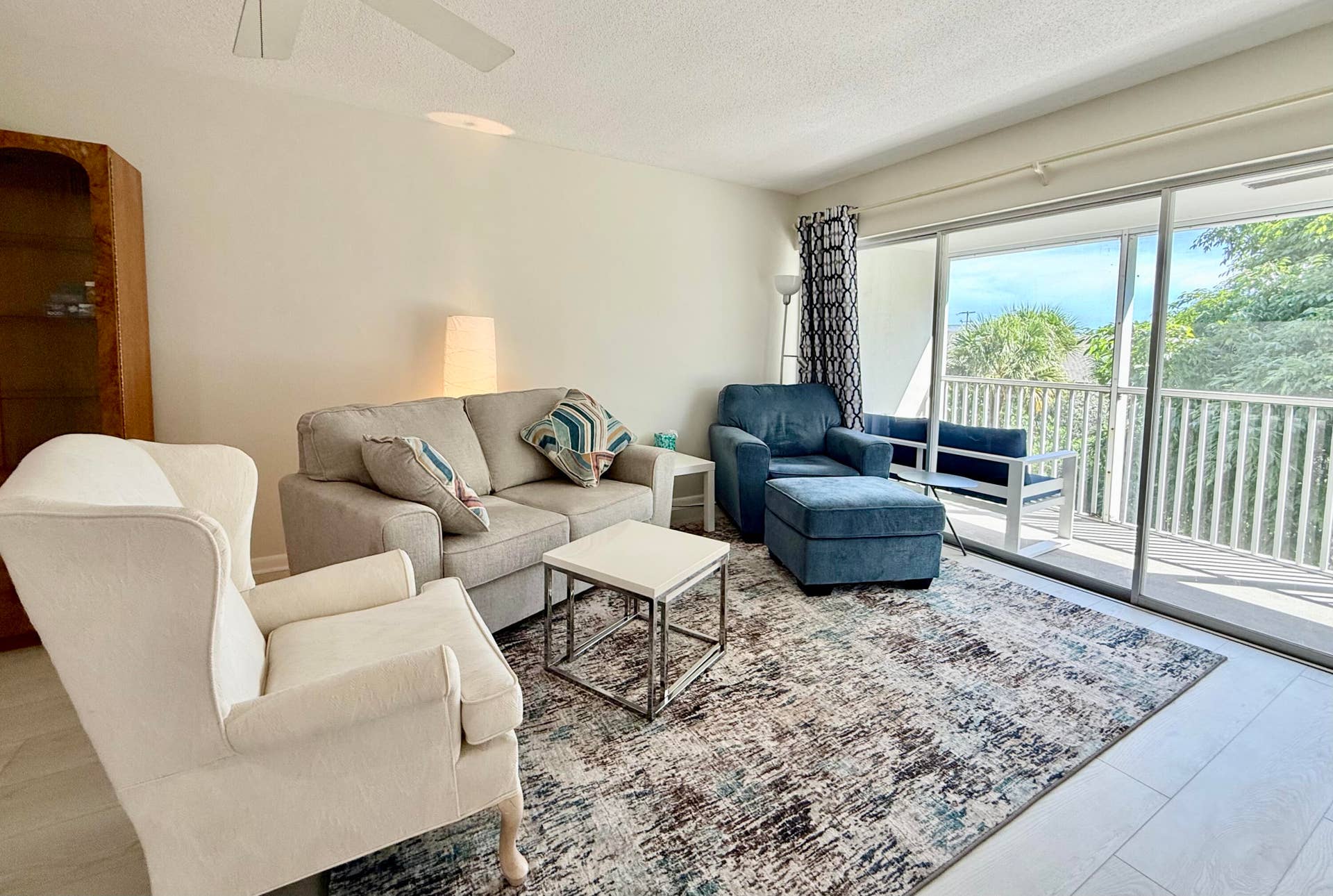 50 Celestial Way, #305, Juno Beach, FL 33408 Living area with deck access