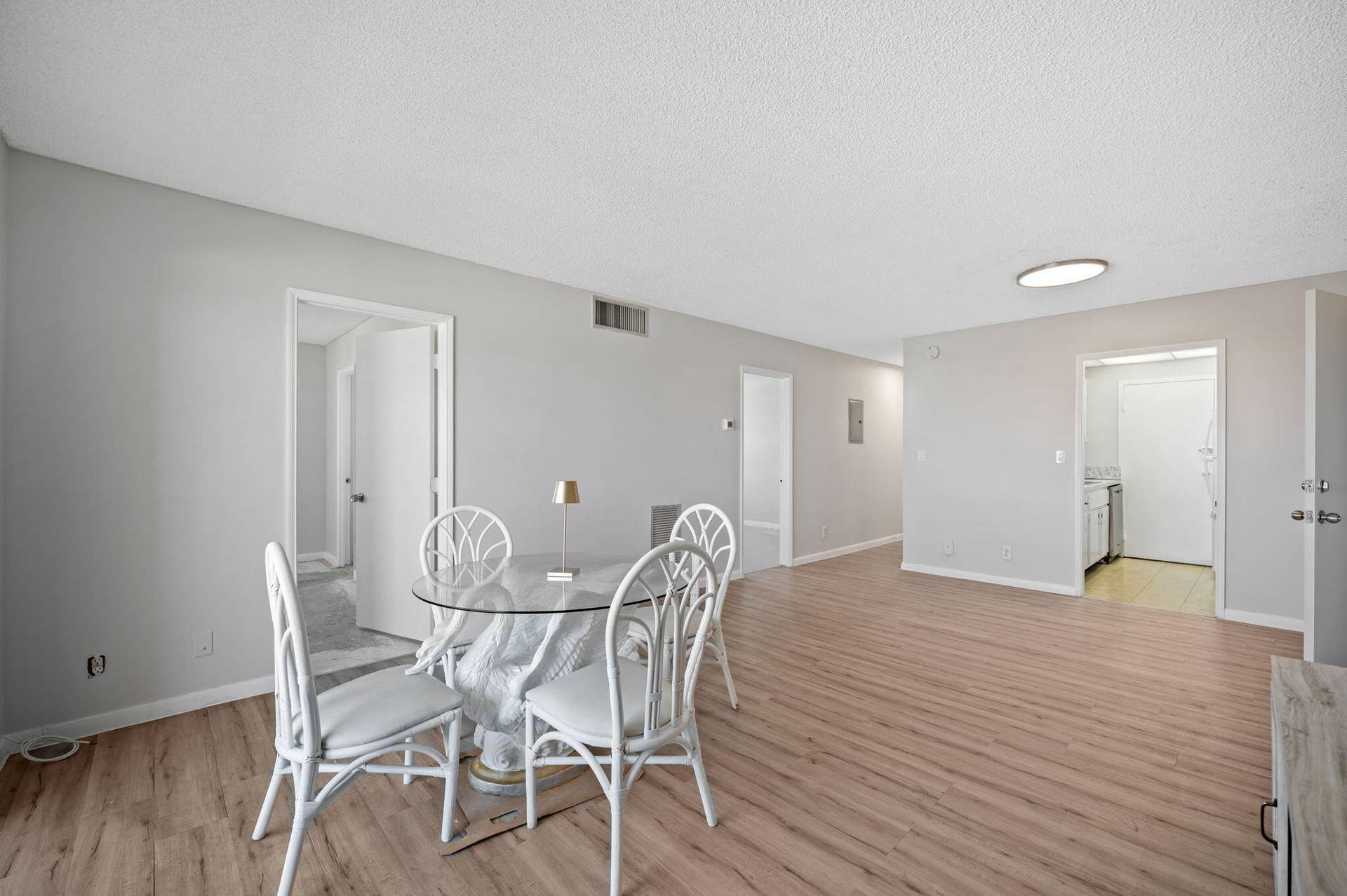 Units PH 1406 & PH 1407 are being sold together for $565,000. Unit 1406 living area, door to kitchen and two bedroom doors.