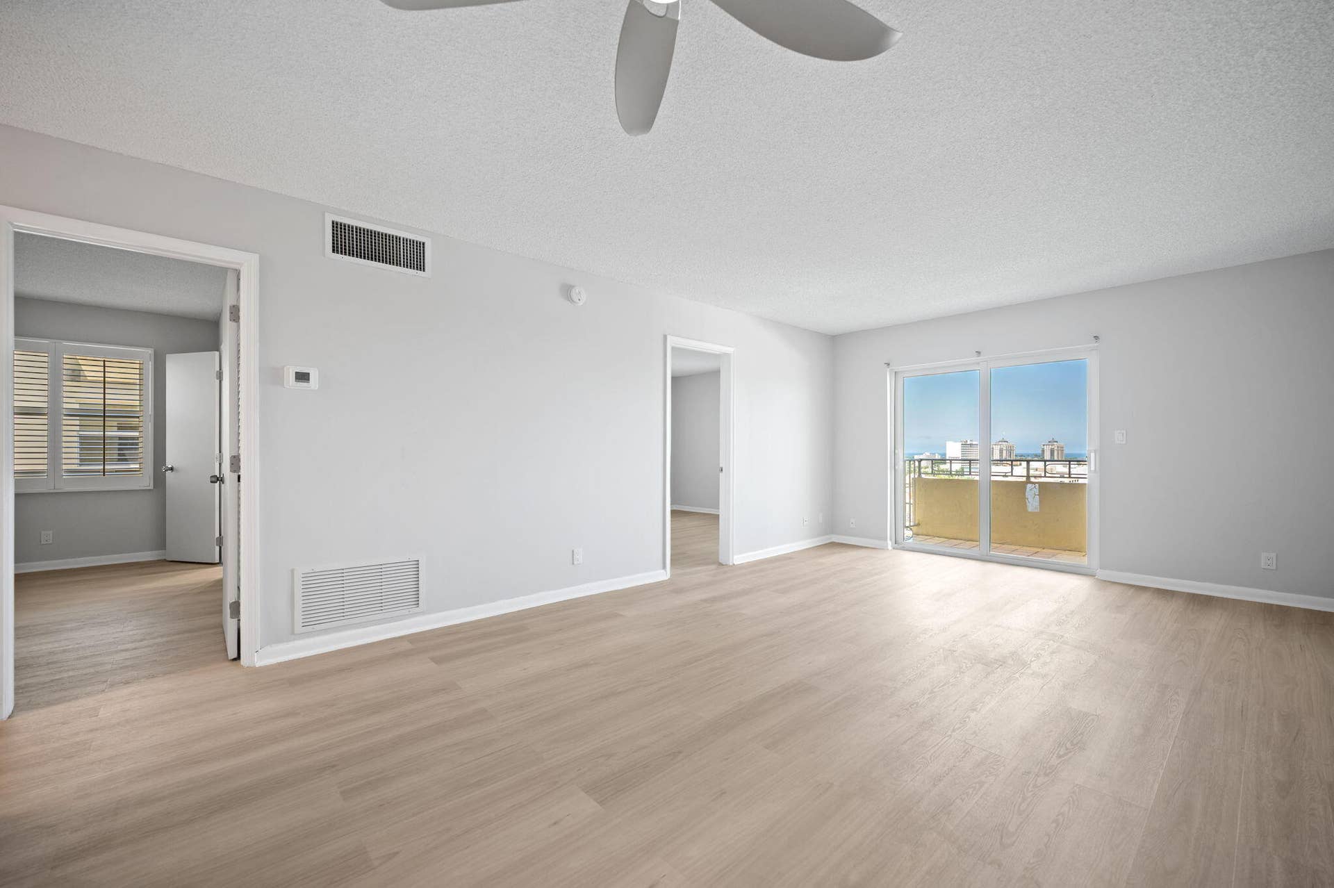 900 NE 18th Avenue, #1407, Fort Lauderdale, FL 33304 Units PH 1406 & PH 1407 are being sold together for $565,000. Unit 1407 living area and the two bedroom doors and balcony.