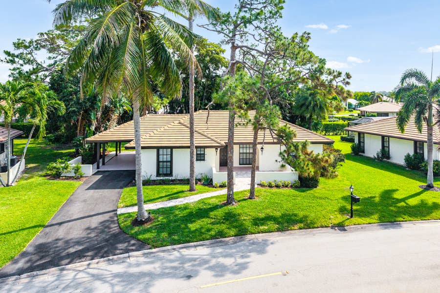 Property photo for 433 Pine Villa Drive, Atlantis, FL