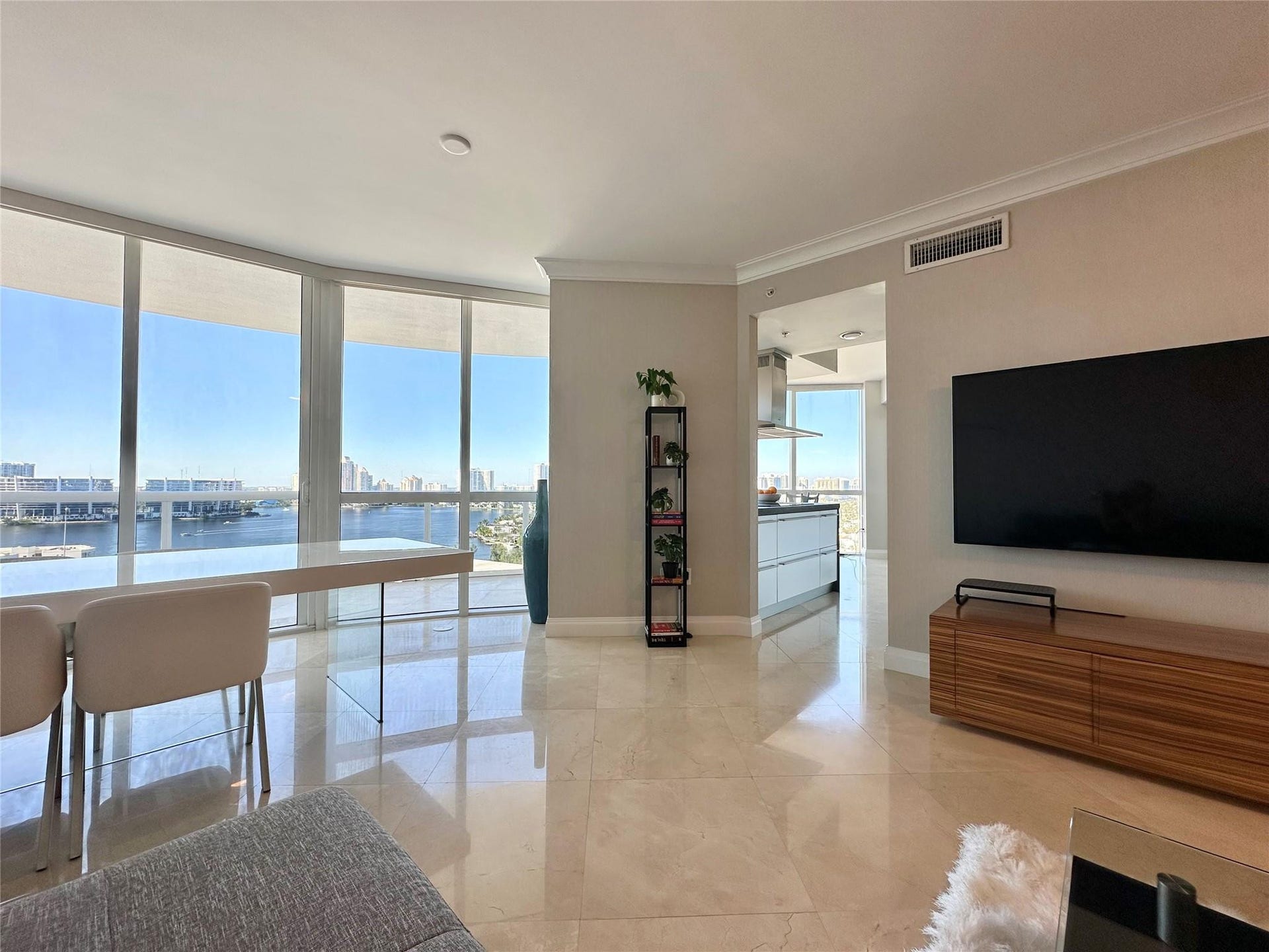 dining area and entrance to kitchen bay views