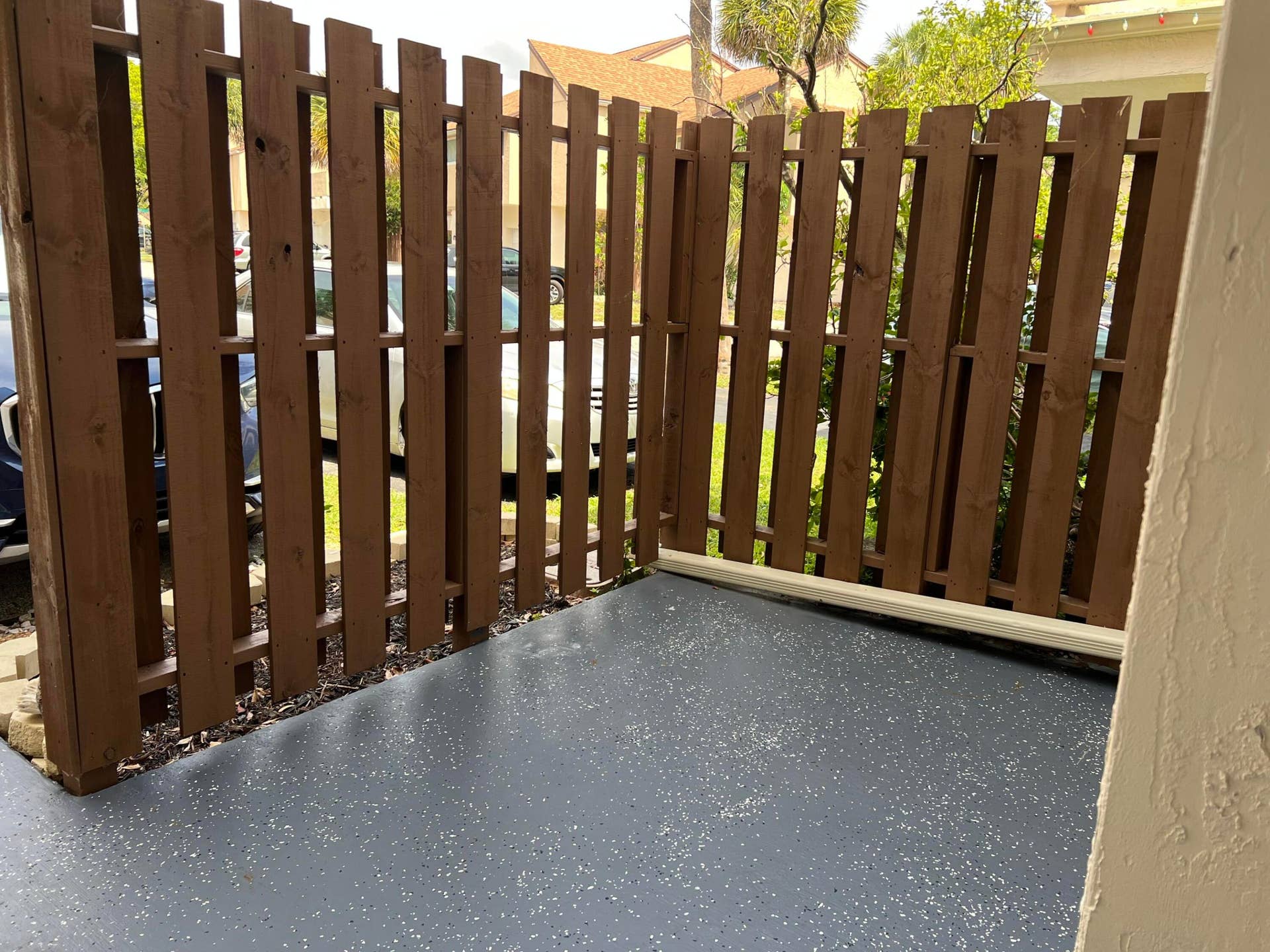 fenced front porch 8244