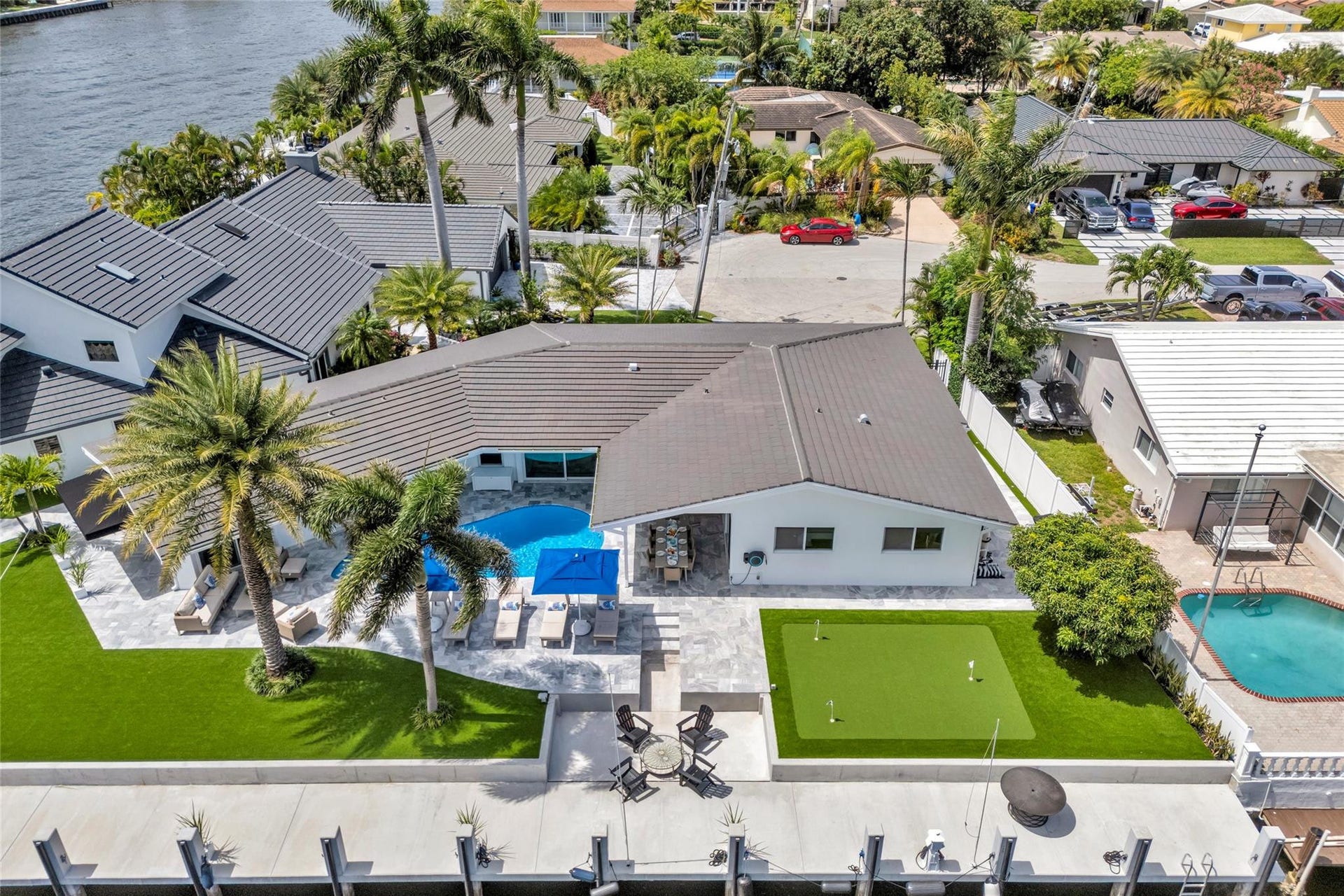 One of kind 3 Bedroom / 3.5 Bathroom Waterfront Estate all 1 Level with Intercostal Views and 150ft of dockage.