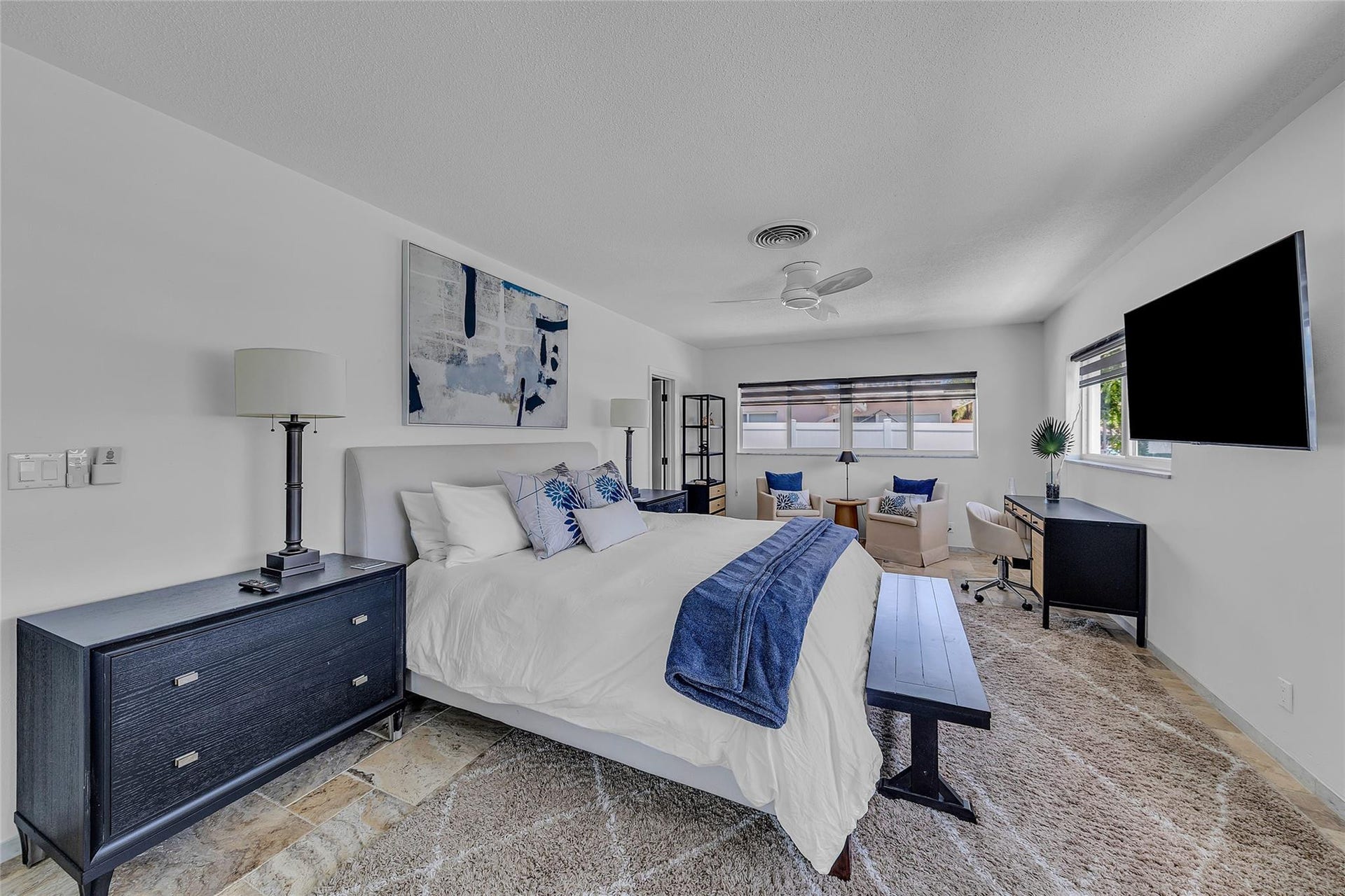 Primary with Sliding Doors to pool & waterway.