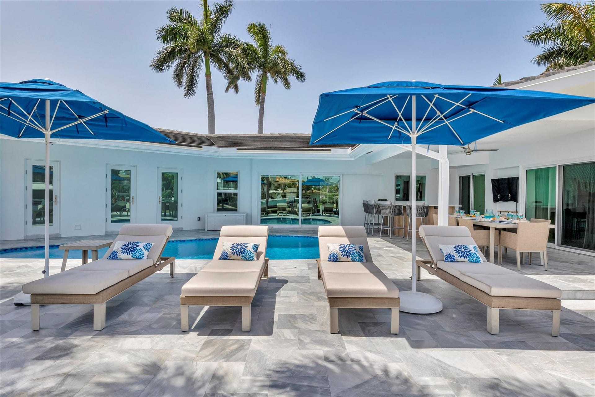 One of kind 3 Bedroom / 3.5 Bathroom Waterfront Estate all 1 Level with Intercostal Views and 150ft of dockage.