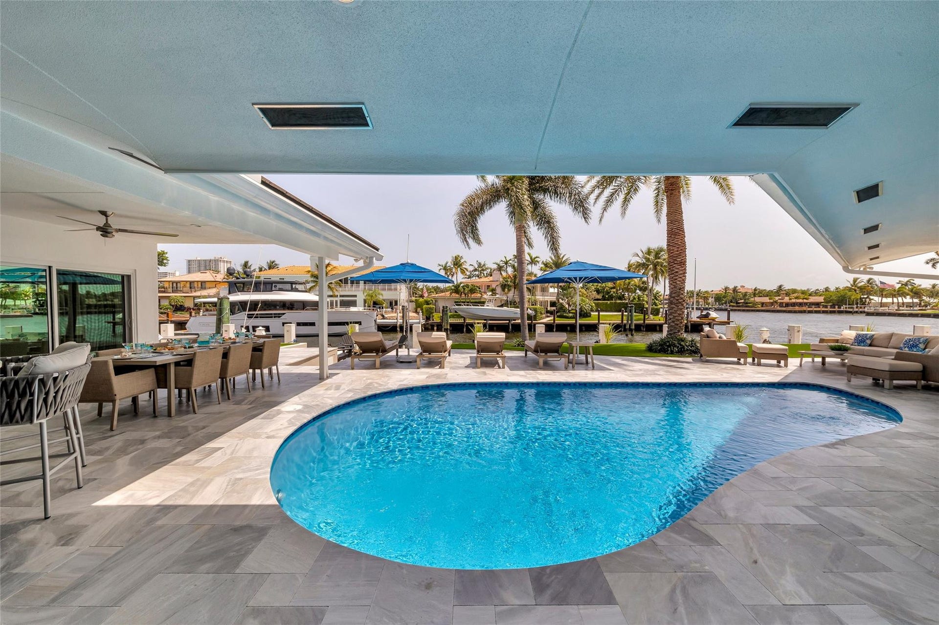 Outdoor patio, pool, dining and lounge