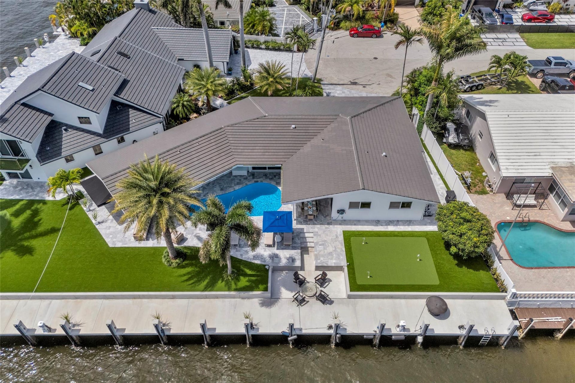 One of kind 3 Bedroom / 3.5 Bathroom Waterfront Estate all 1 Level with Intercostal Views and 150ft of dockage.