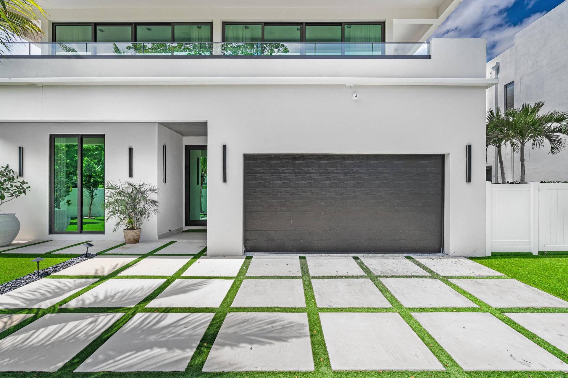 Striking front elevation showcasing refined curb appeal and elegant architecture.