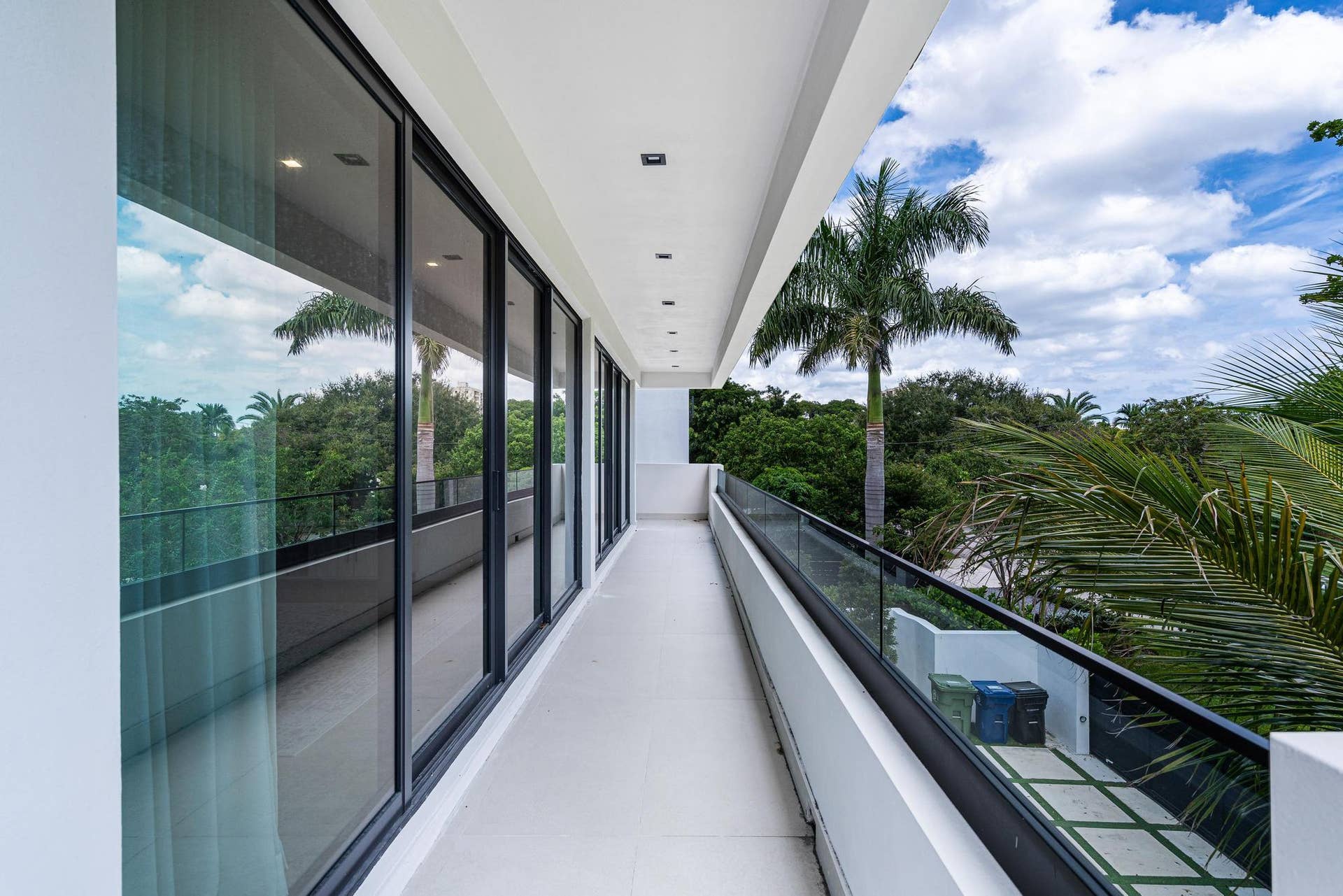 Front balconies shared by two east-facing bedrooms with abundant of light.